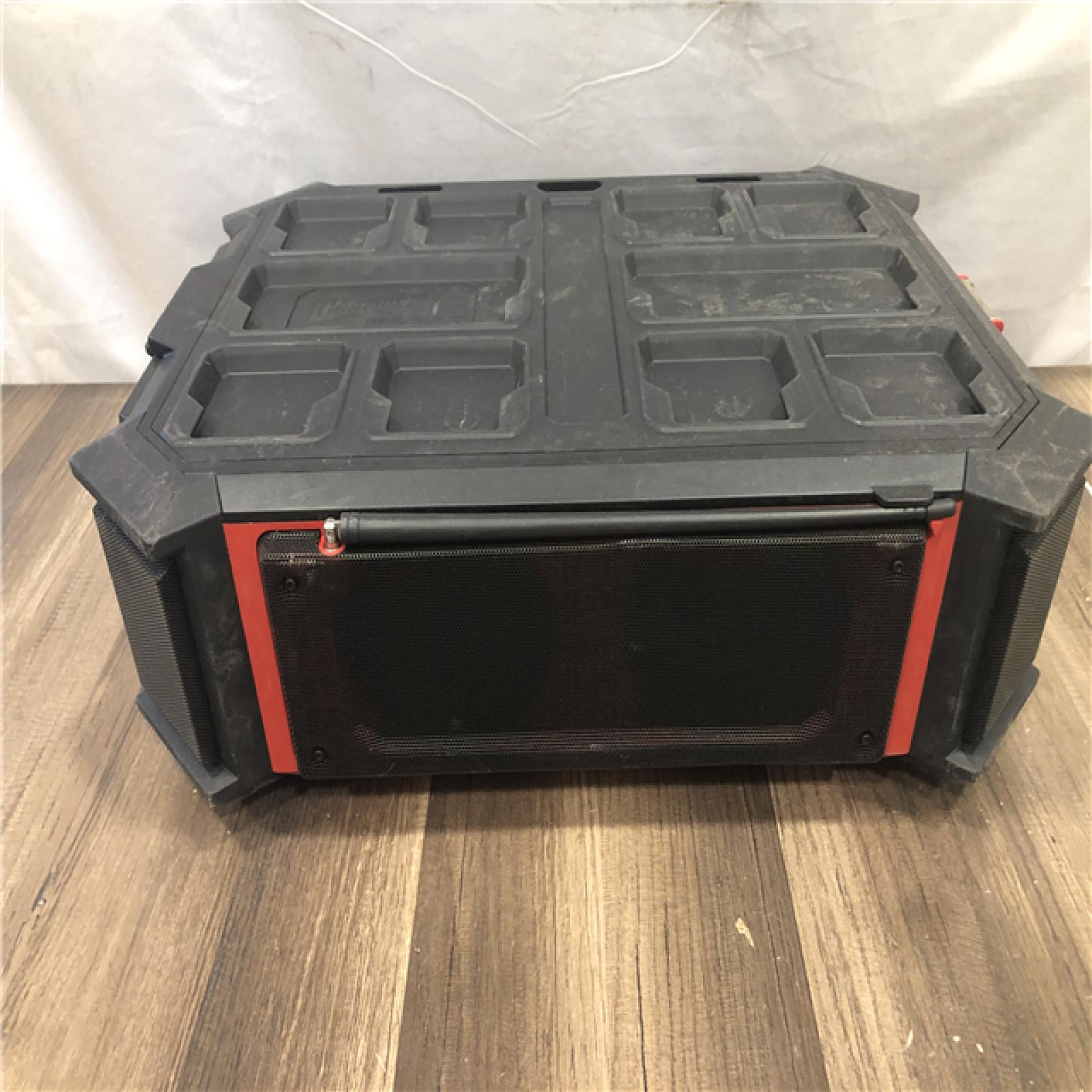 AS-IS Milwaukee Lithium-Ion Cordless PACKOUT Radio/Speaker with Built-In Charger