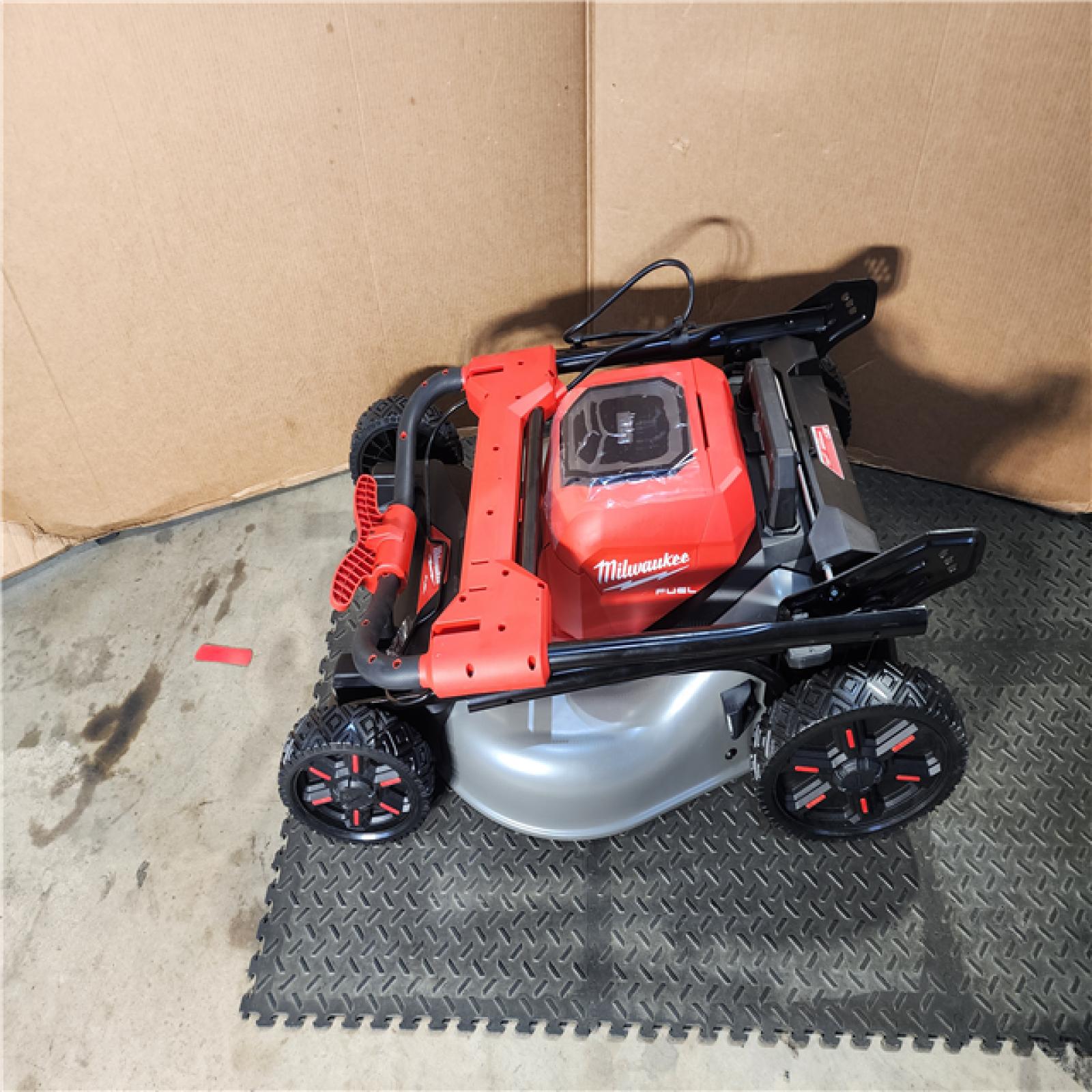 HOUSTON LOCATION - AS-IS M18 FUEL Brushless Cordless 21 in. Walk Behind Dual Battery Self-Propelled Mower W/ Rapid Charger