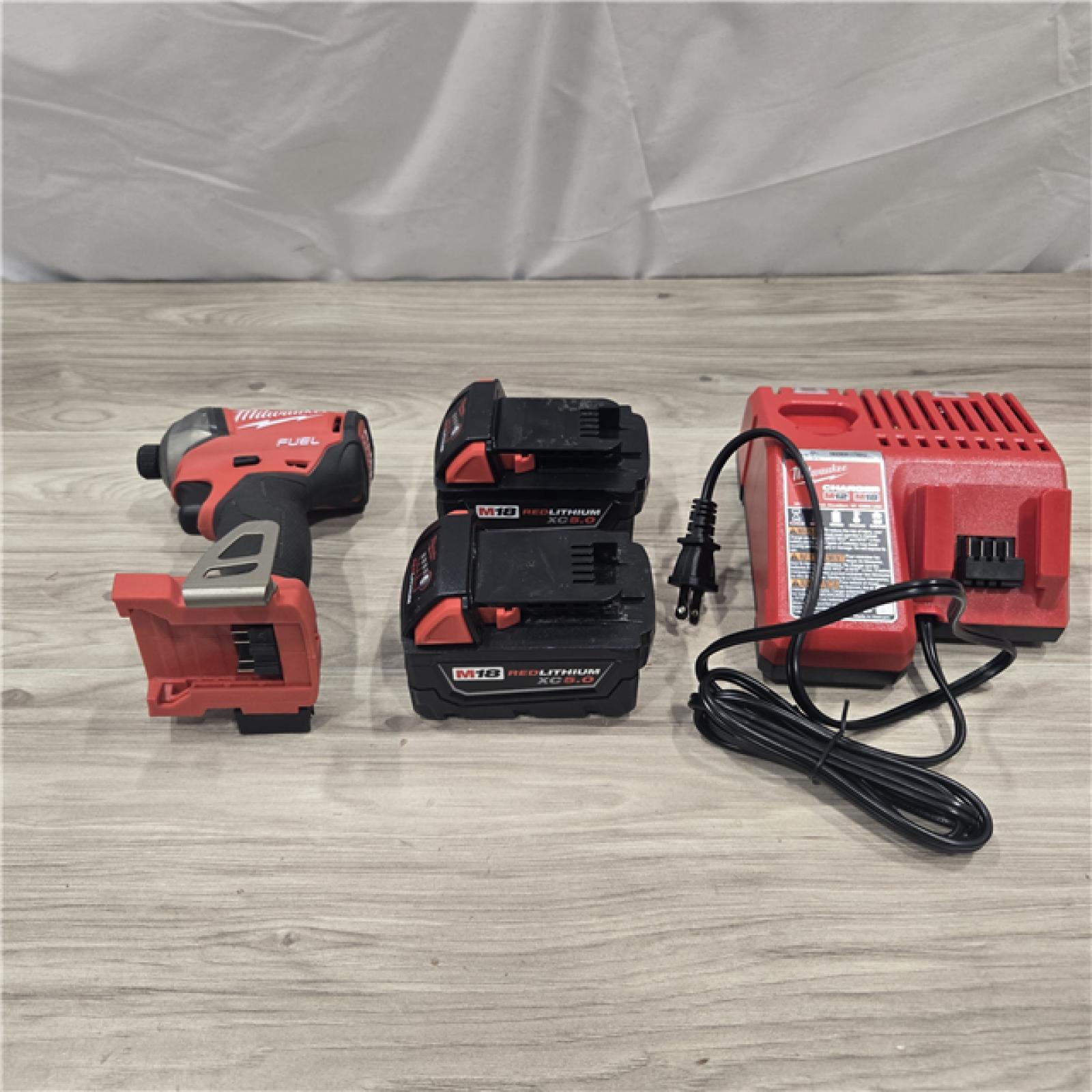 AS-IS Milwaukee M18 FUEL SURGE 18V Cordless 1/4 in. Hex Impact Driver Compact Kit