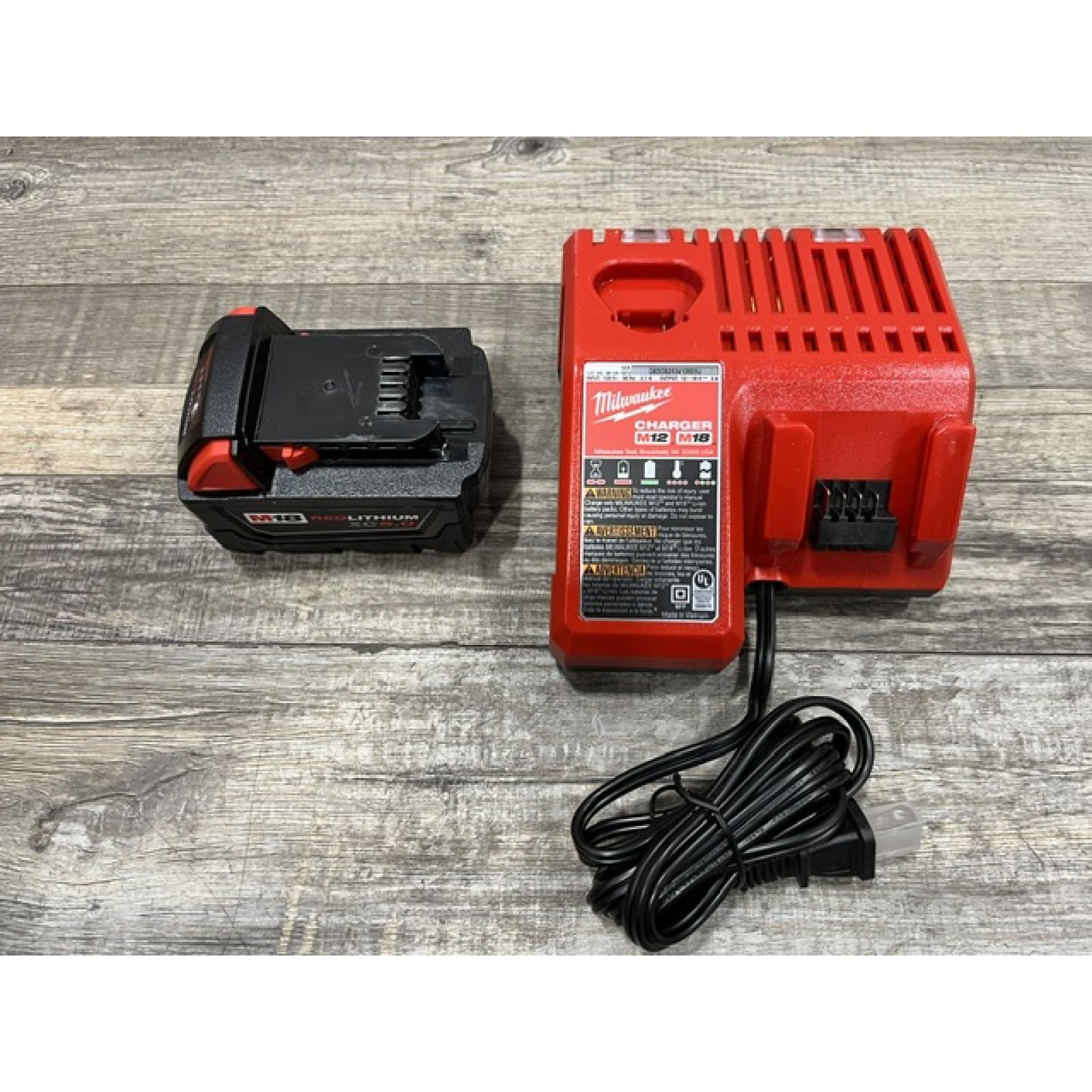 AS-IS Milwaukee 18-Volt Lithium-Ion XC Starter Kit with One 5.0Ah Battery and Charger