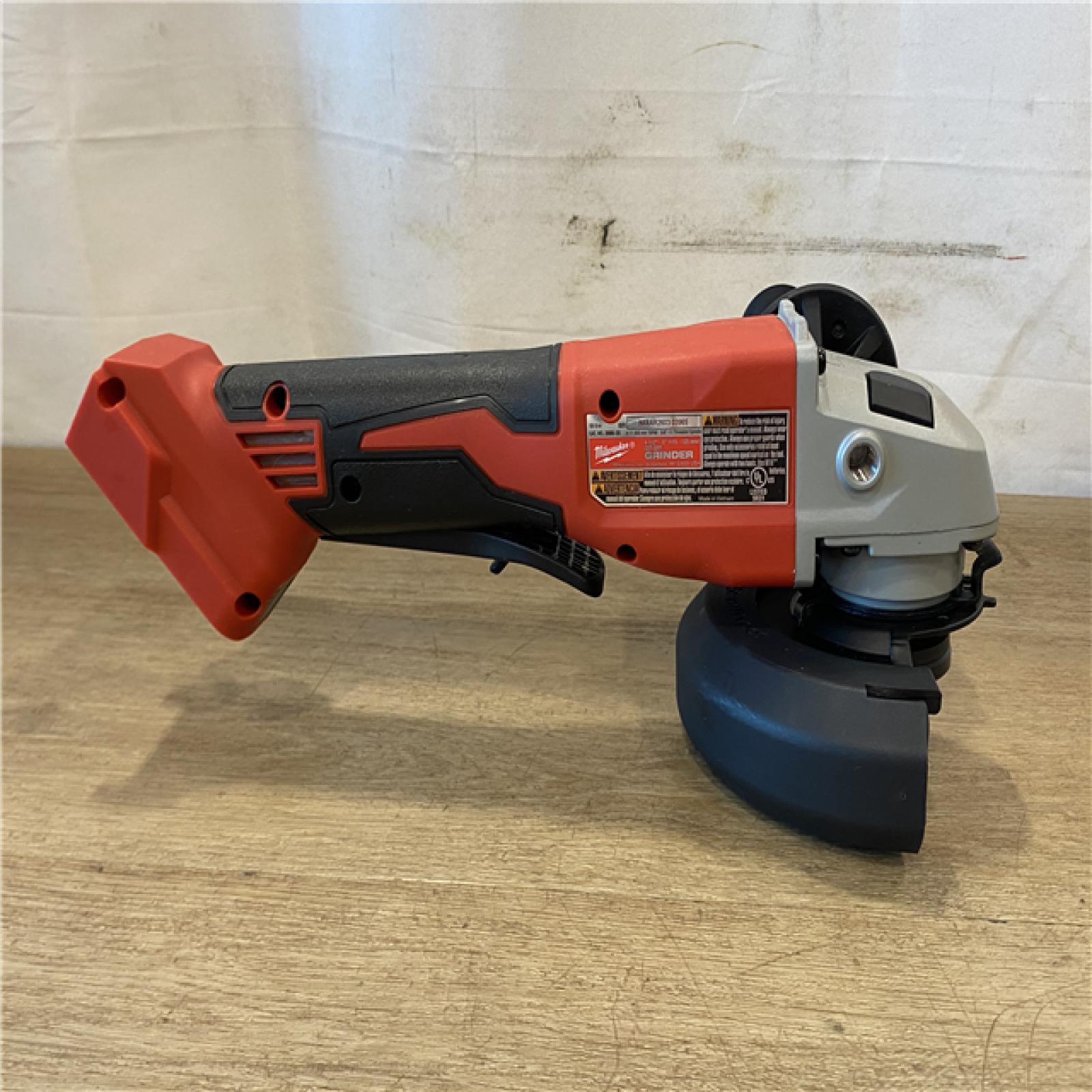 AS-IS Milwaukee 18V Lithium-Ion Brushless Cordless 4-1/2 in./5 in. Grinder w/Paddle Switch (Tool-Only)