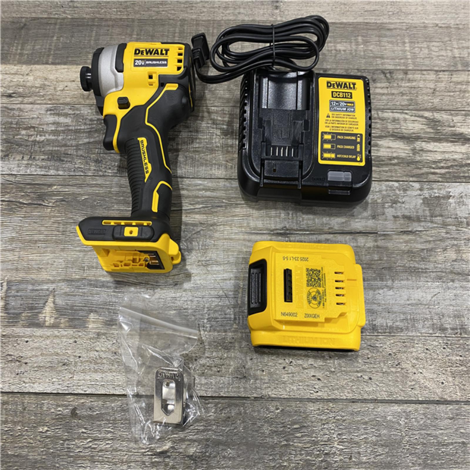 AS-IS DEWALT Atomic 20V Max Lithium-Ion Brushless Cordless Compact 1/4 in. Impact Driver Kit
