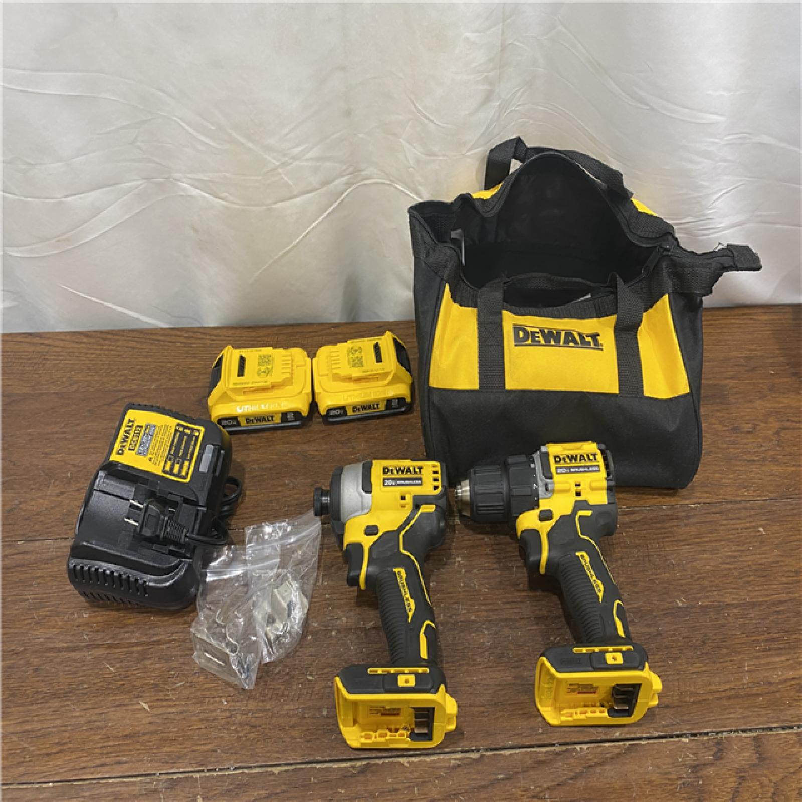 AS-IS DEWALT ATOMIC 20-Volt MAX Lithium-Ion Cordless Combo Kit (2-Tool) with (2) 2.0Ah Batteries, Charger and Bag