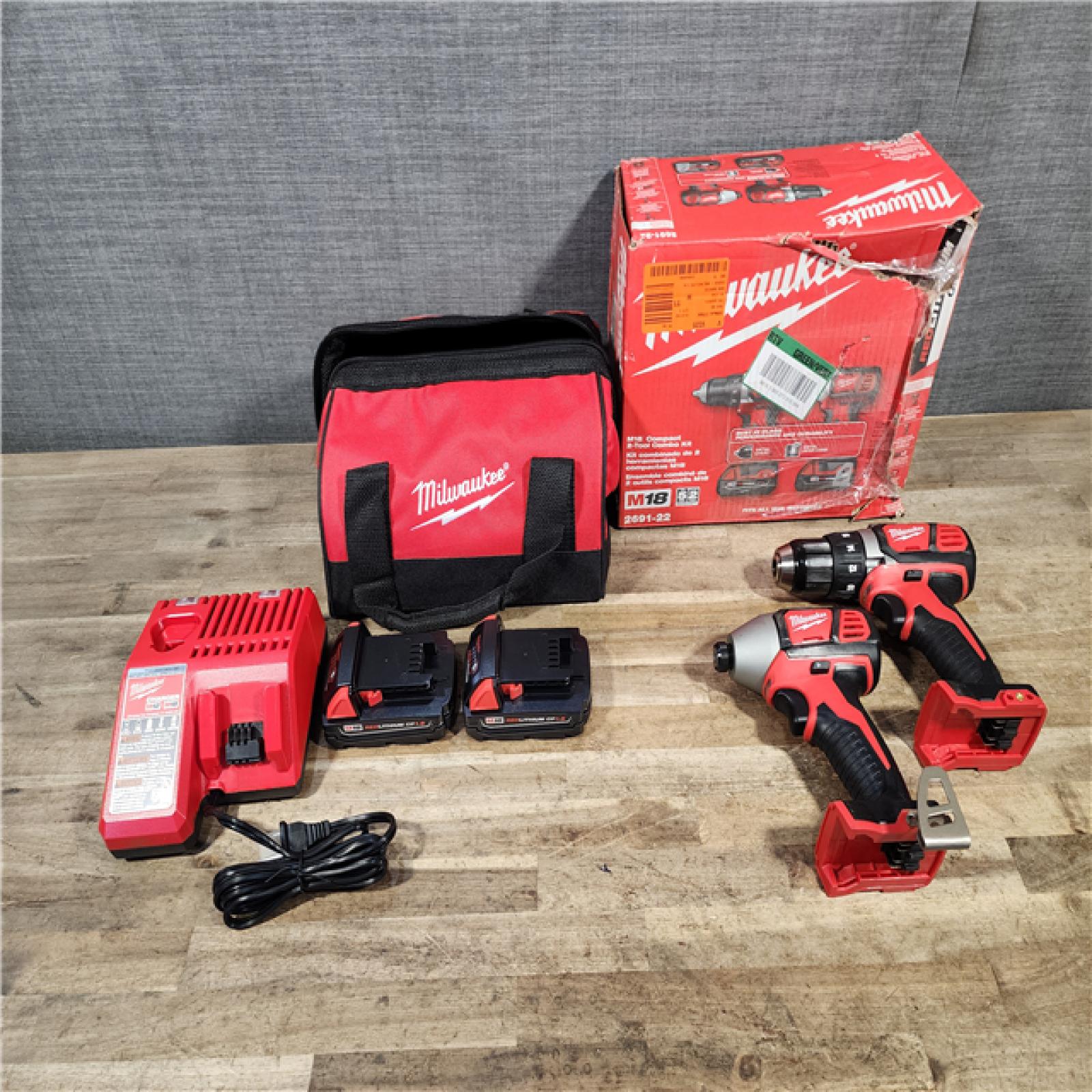 HOUSTON LOCATION - AS-IS Milwaukee M18 Brushed Cordless (2-Tool) Drill/Driver and Impact Driver Kit