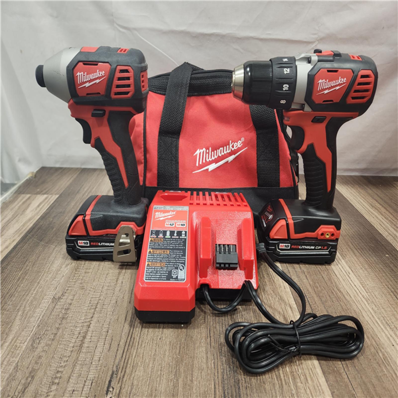 AS-IS- Milwaukee 18V Cordless Brushed 2-Tool Drill/Driver and Impact Driver Kit
