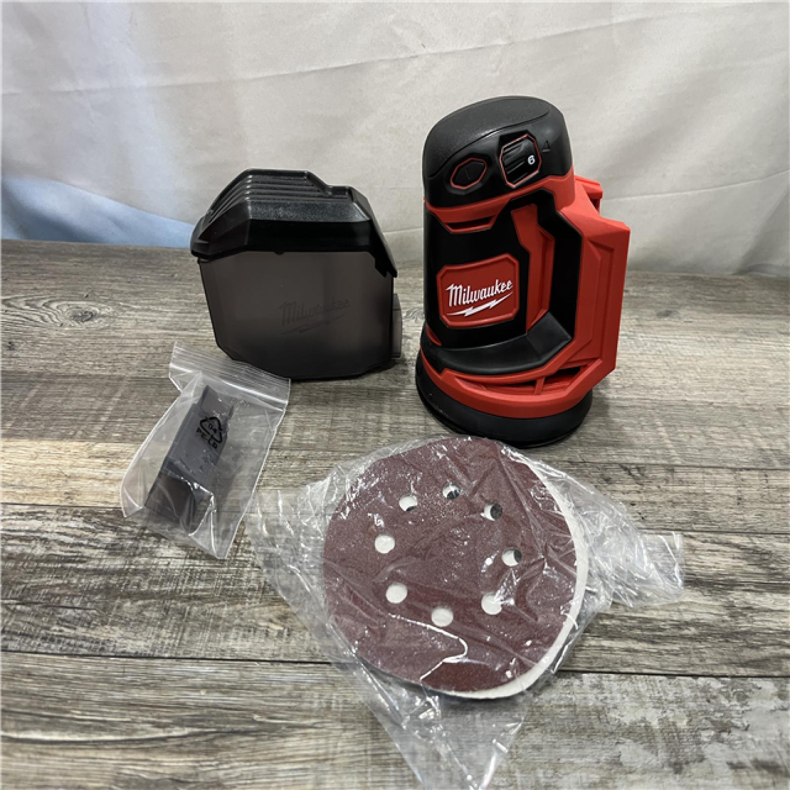 AS-IS Milwaukee 18V Lithium-Ion Cordless 5 in. Random Orbit Sander (Tool-Only)