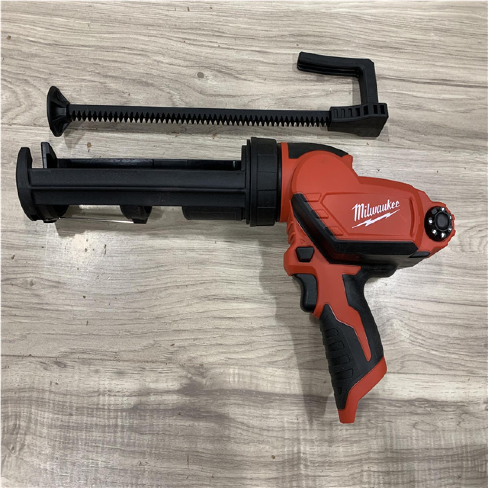 AS-IS Milwaukee 12V Lithium-Ion Cordless 10 oz. Adhesive and Caulk Gun (Tool-Only)