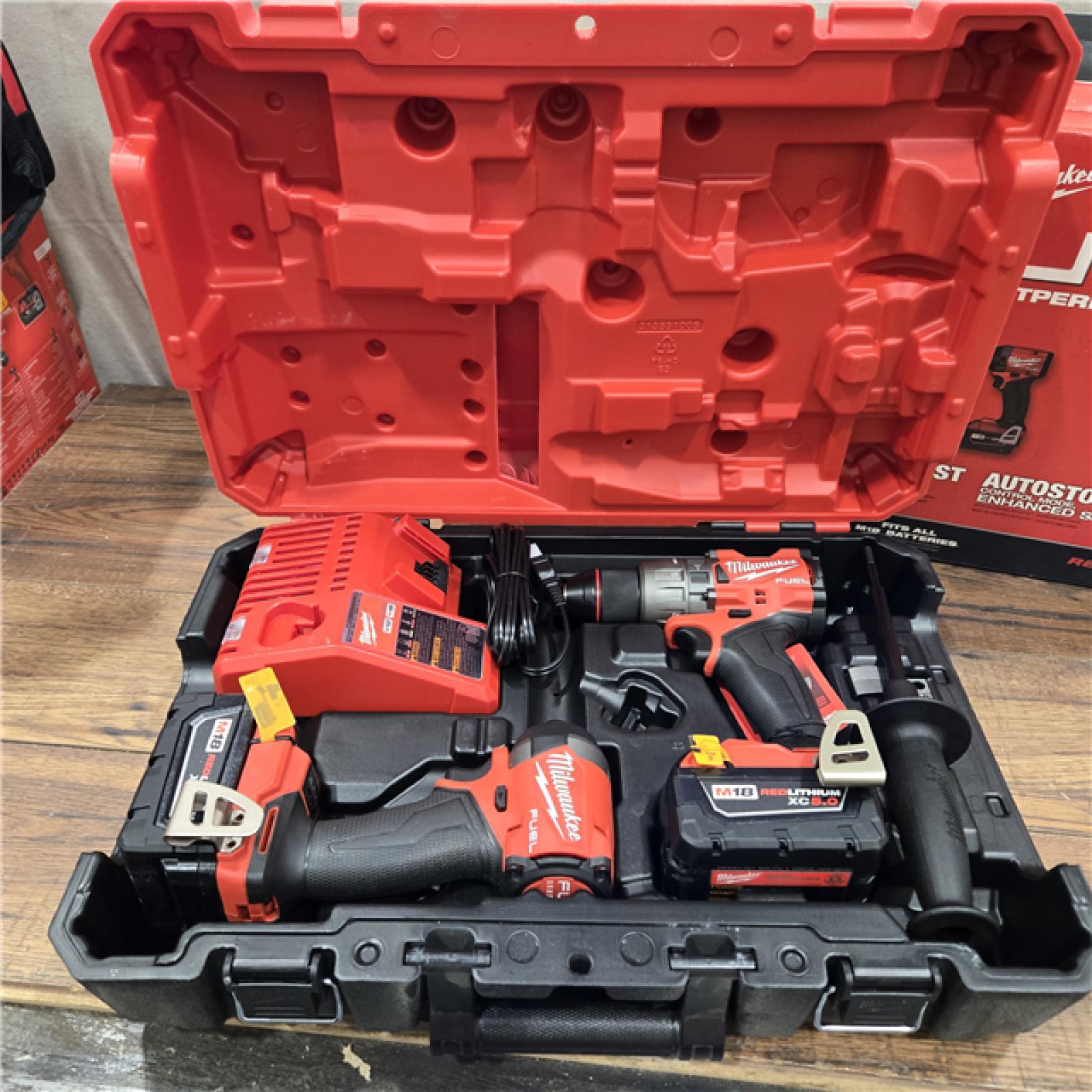 AS-IS Milwaukee M18 FUEL 18V Lithium-Ion Brushless Cordless Hammer Drill and Impact Driver Combo Kit (2-Tool) with 2 Batteries