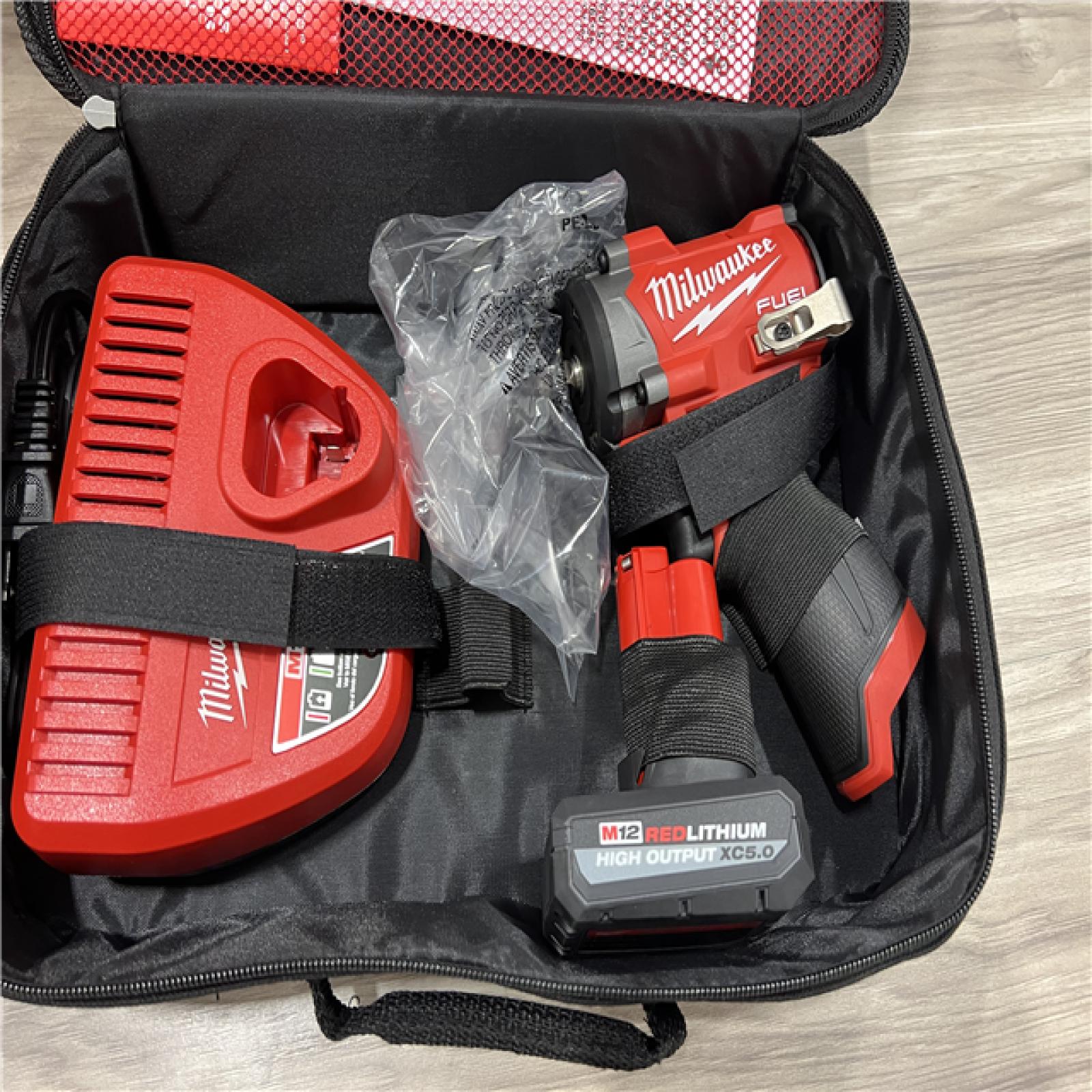 AS-IS Milwaukee FUEL 12V Li-Ion Brushless Cordless Stubby 3/8 in. Impact Wrench Kit