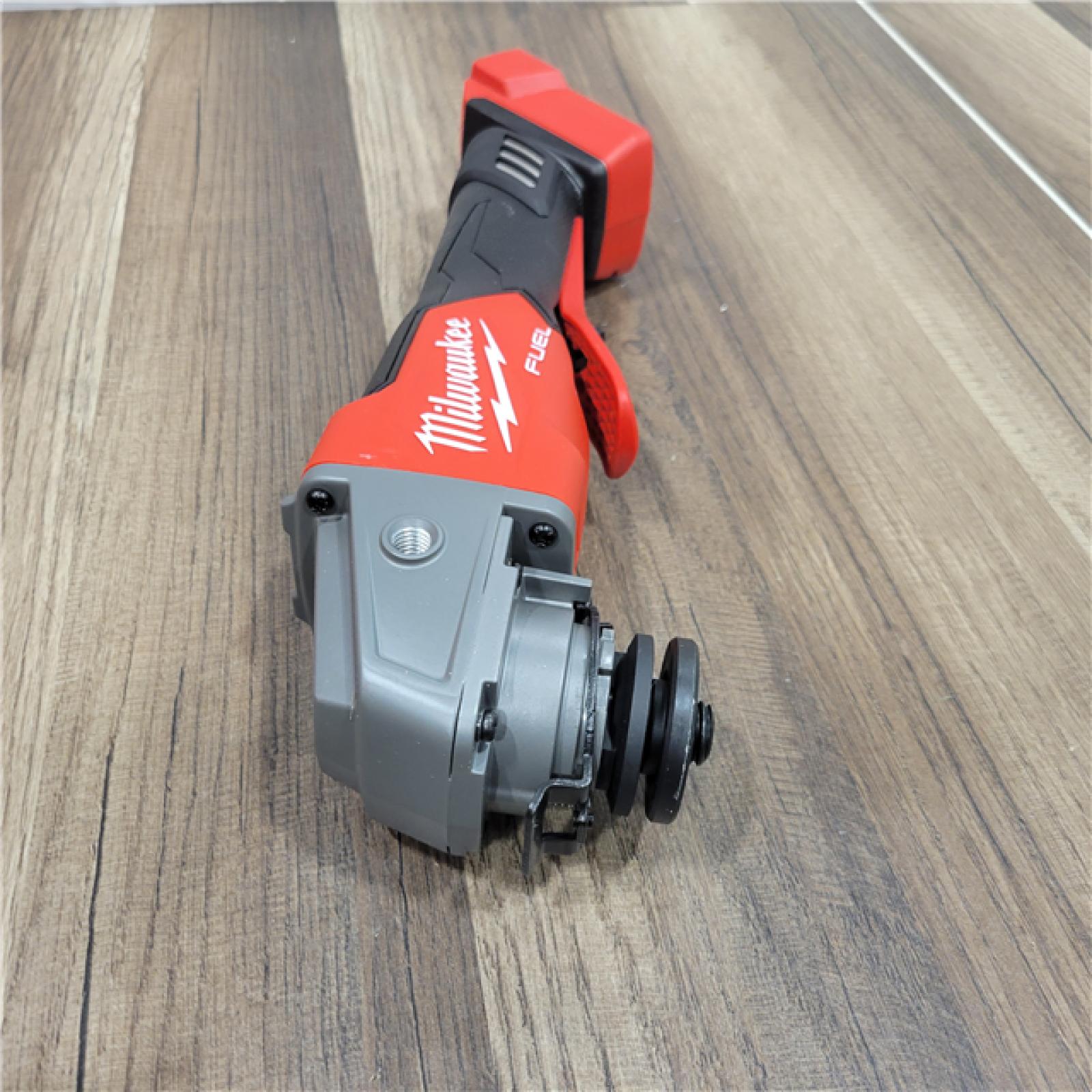 AS-IS Milwaukee  M18 FUEL 18-Volt Lithium-Ion Brushless Cordless 4-1/2 in./5 in. Grinder W/Paddle Switch (Tool-Only)