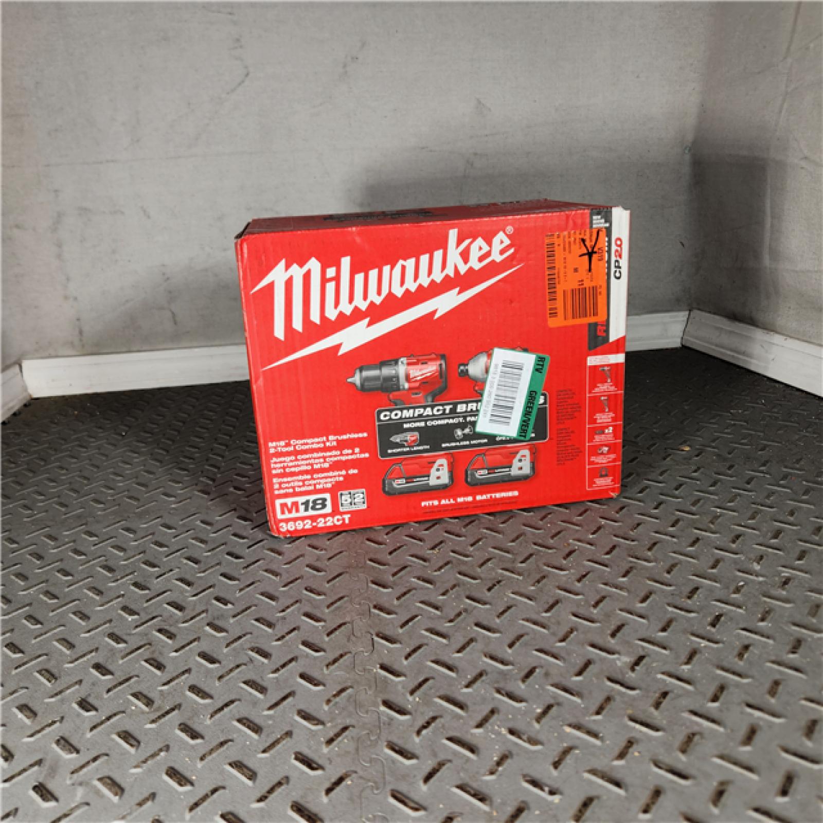 Houston Location - As-Is Milwaukee 3692-22CT 18V M18 Lithium-Ion Compact Brushless Cordless 2-Tool Combo Kit with 1/2 Drill/Driver and 1/4 Hex Impact Driver 2.0 Ah - Appears IN GOOD Condition