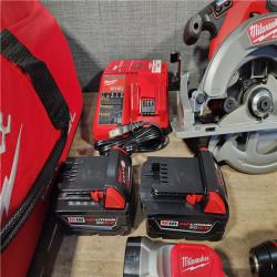 HOUSTON LOCATION - AS-IS (APPEARS LIKE NEW) Milwaukee M18 FUEL 18V Lithium-Ion Brushless Cordless Combo Kit with Two 5.0 Ah Batteries  1 Charger  2 Tool Bags (7-Tool)