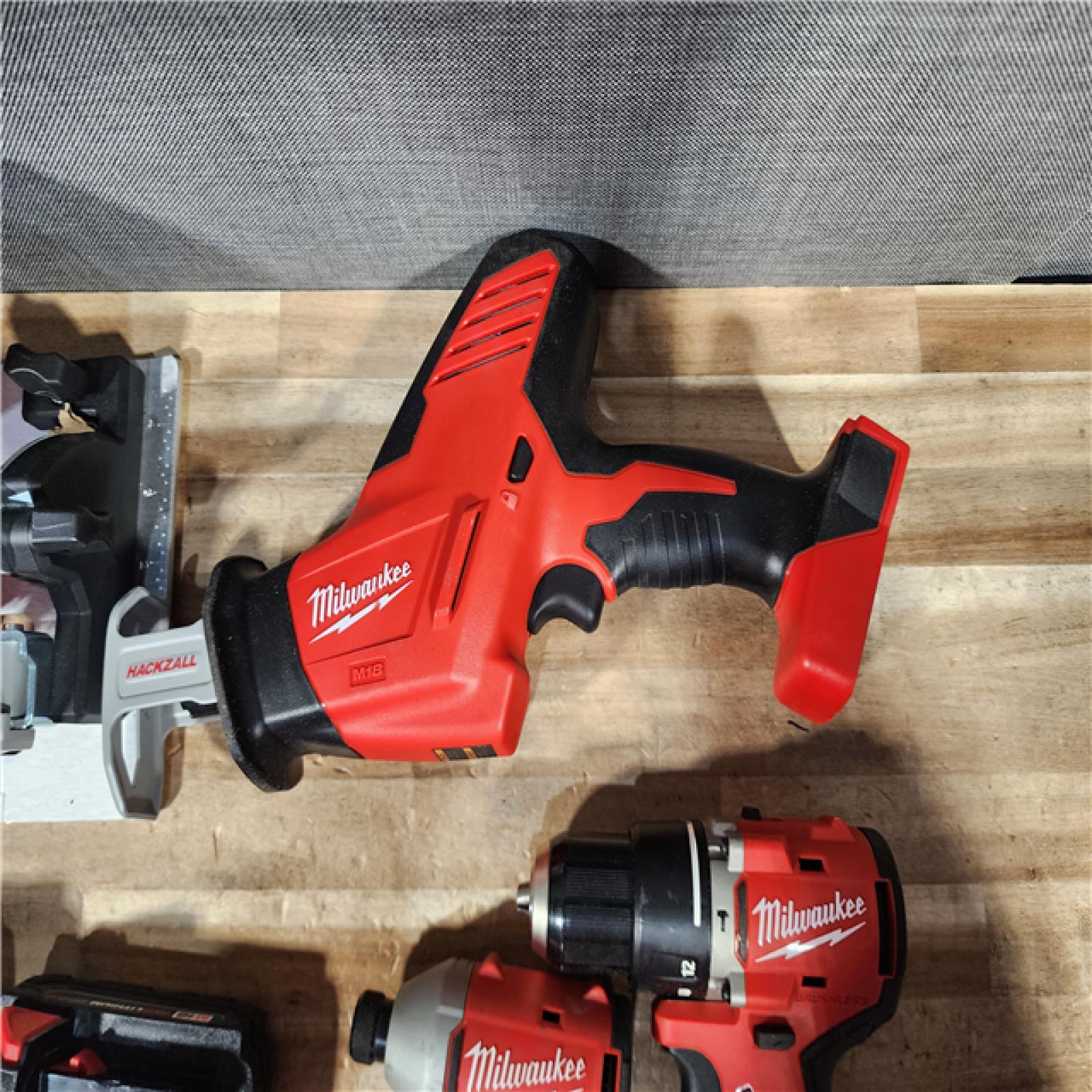HOUSTON LOCATION - AS - IS Milwaukee 18-Volt Lithium-Ion Brushless Cordless (4-Tool) Combo Kit