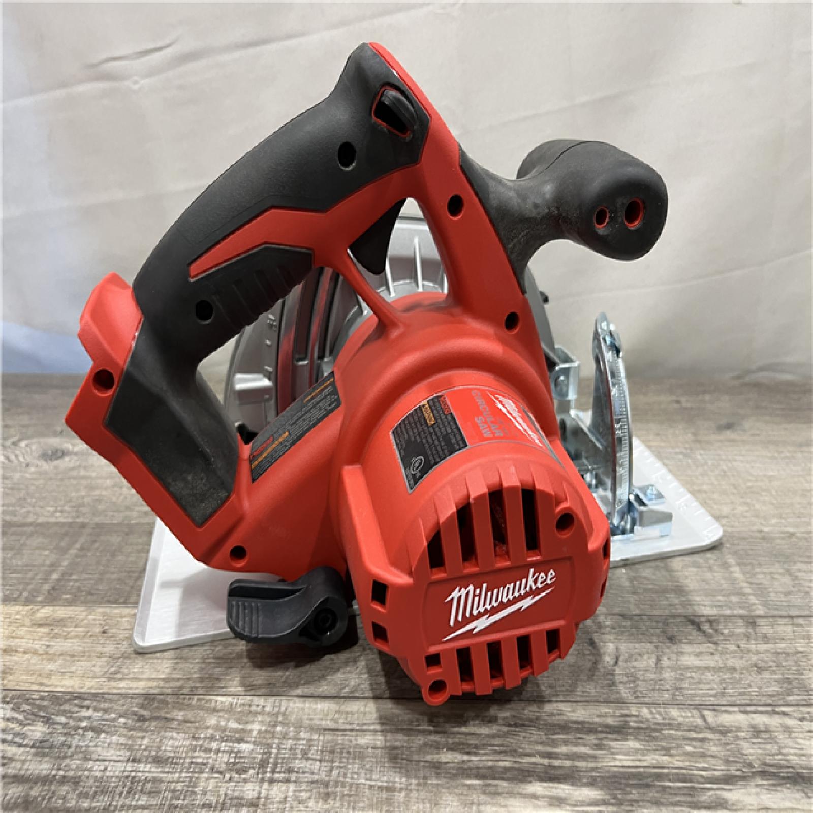 AS-IS Milwaukee 18V Lithium-Ion Cordless 6-1/2 in. Circular Saw (Tool-Only)