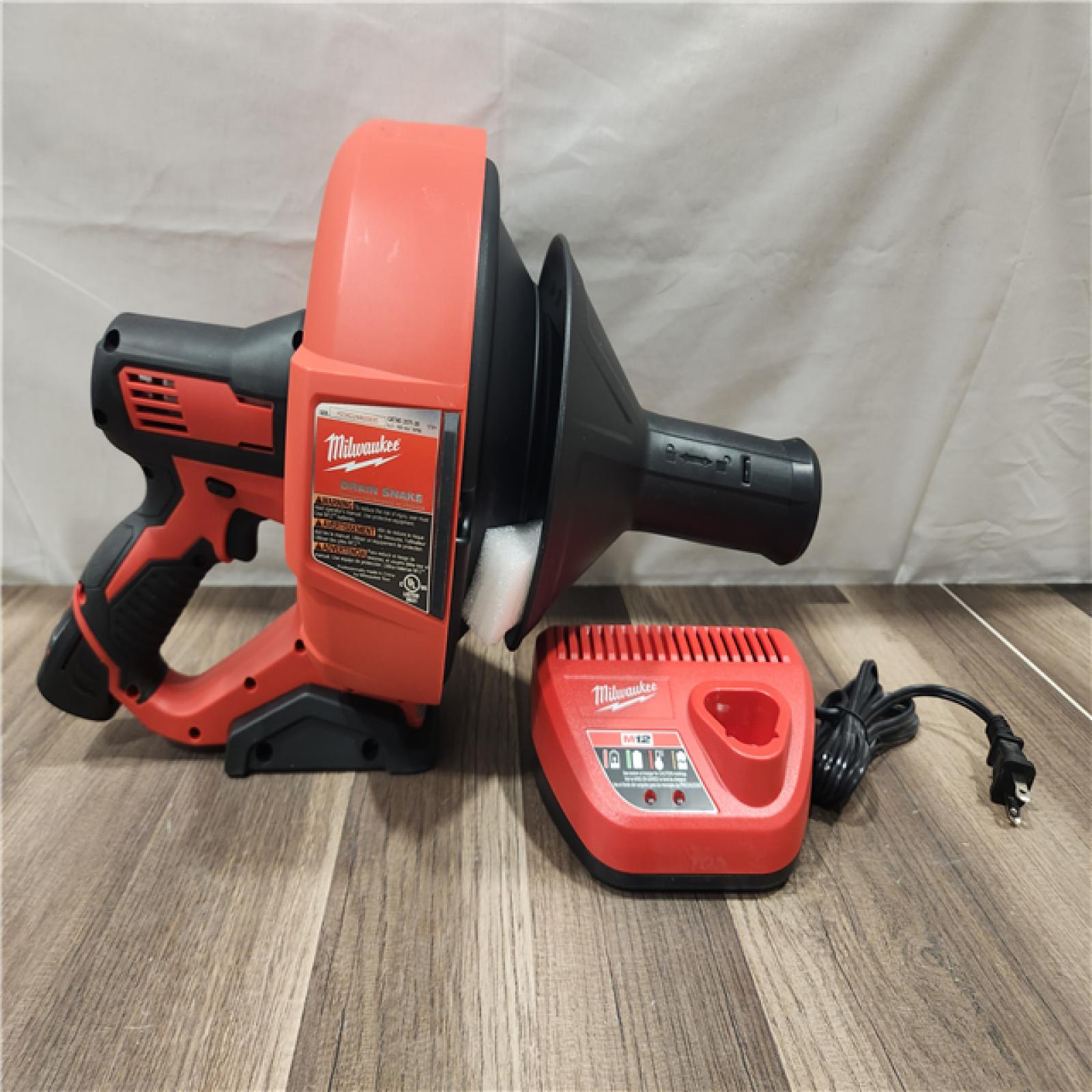 AS-IS- M12 12-V Lithium-Ion Cordless Drain Snake Auger W/ (1) 1.5Ah Battery  5/16 in. X 25 Ft. Cable  Charger  & 5 Gal. Bucket