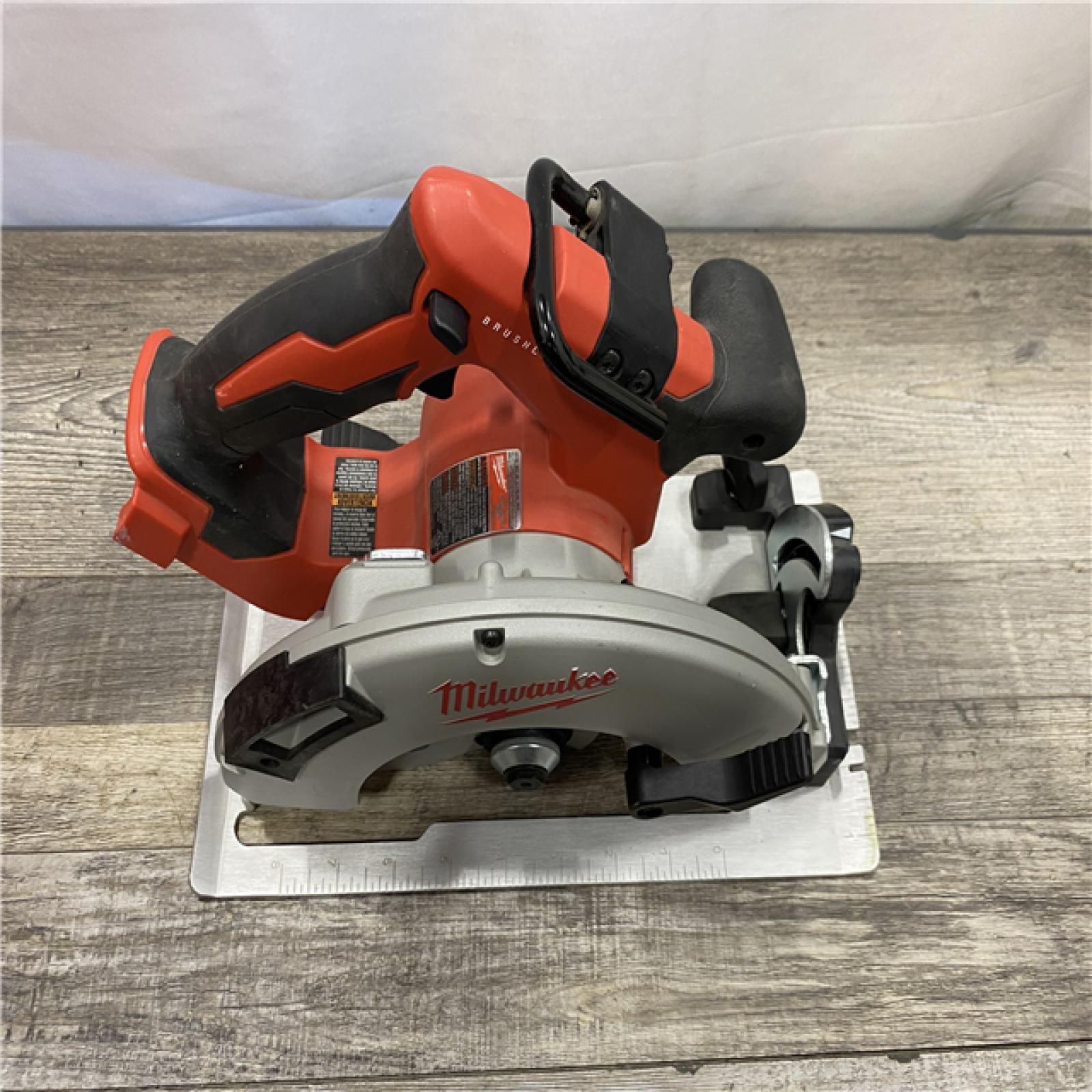 AS-IS Milwaukee 18V Lithium-Ion Brushless Cordless 7-1/4 in. Circular Saw (Tool-Only)