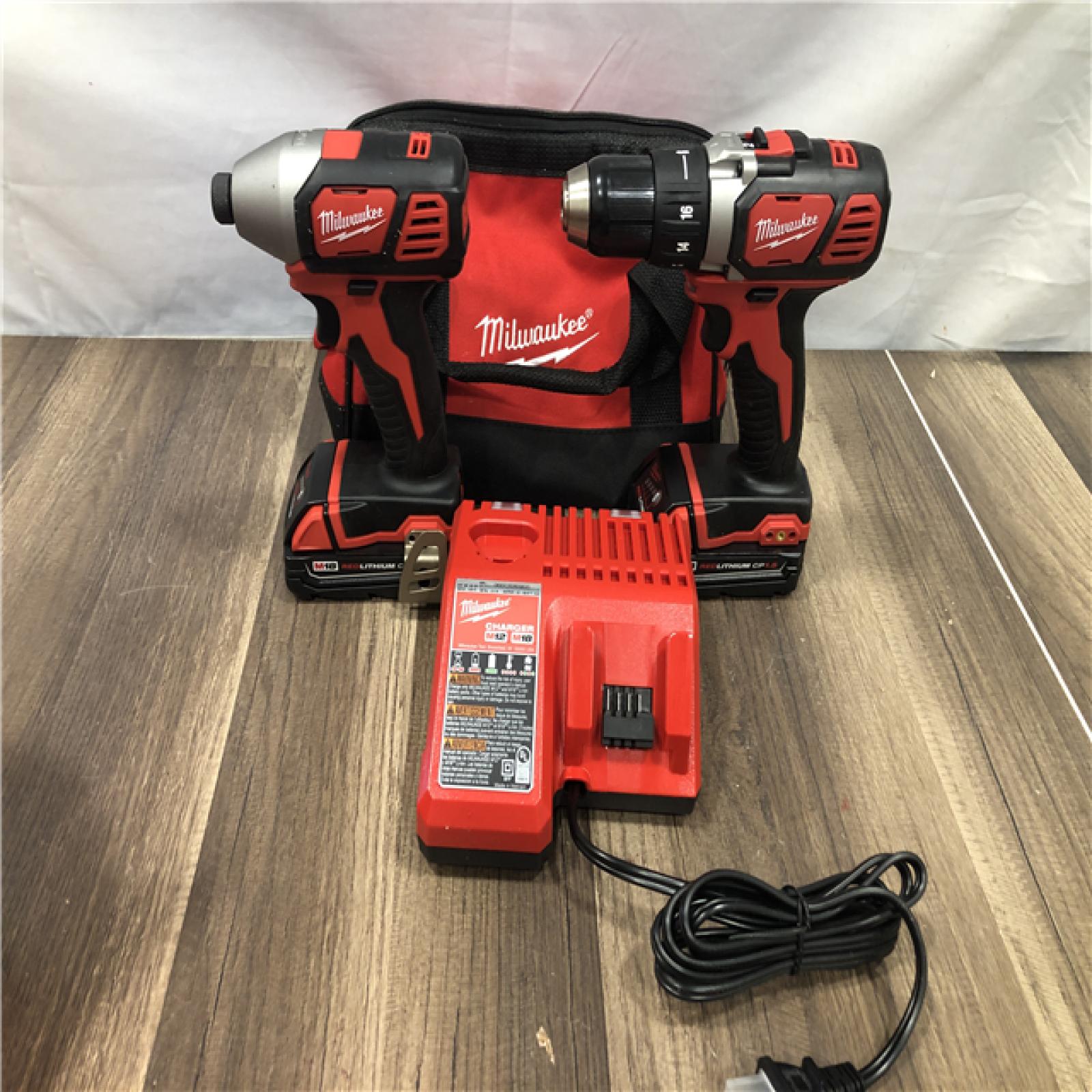 AS-IS Milwaukee M18 18V Lithium-Ion Cordless Drill Driver/Impact Driver Combo Kit