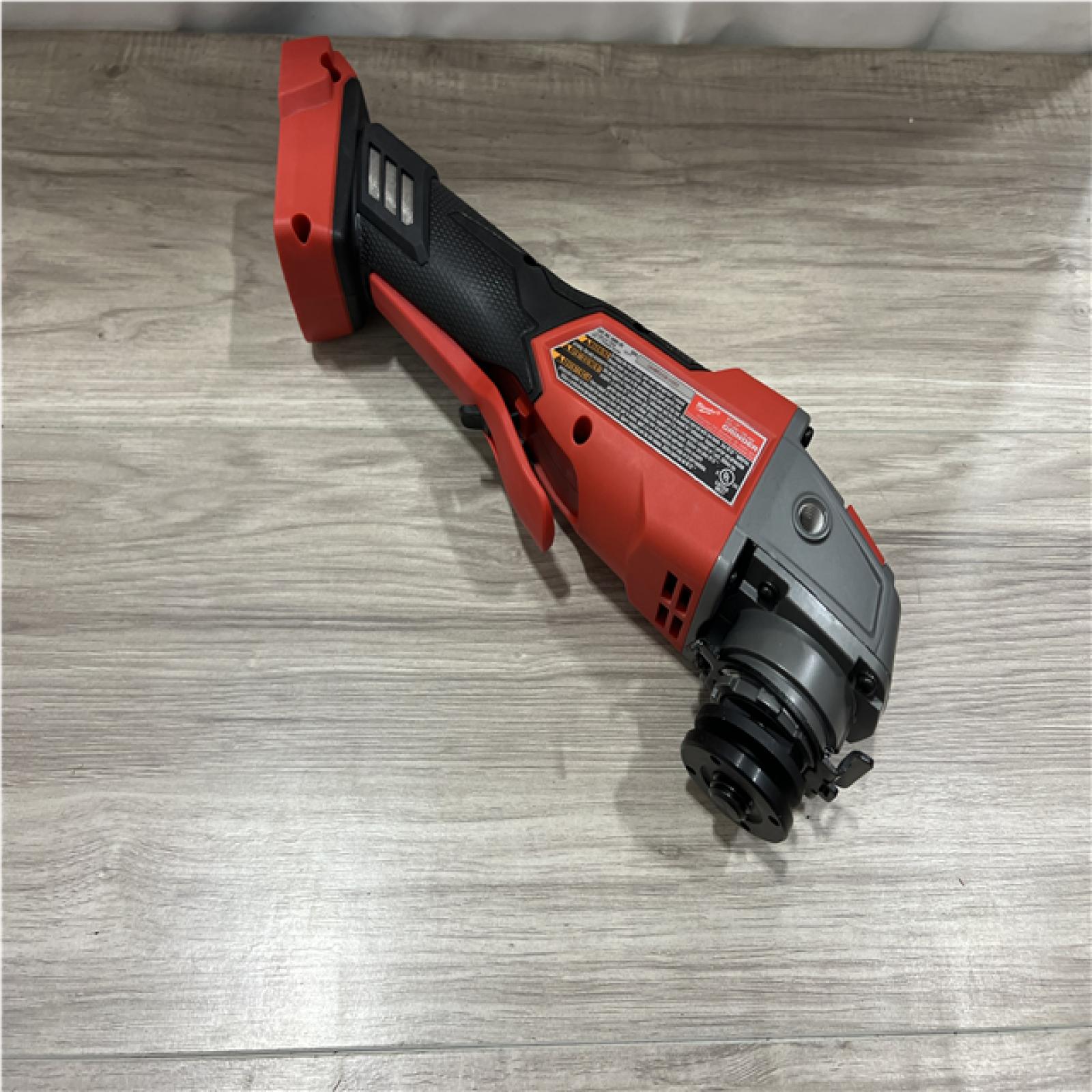 AS-IS Milwaukee FUEL 18V Lithium-Ion Brushless Cordless 4-1/2 in./5 in. Grinder w/Paddle Switch (Tool-Only)