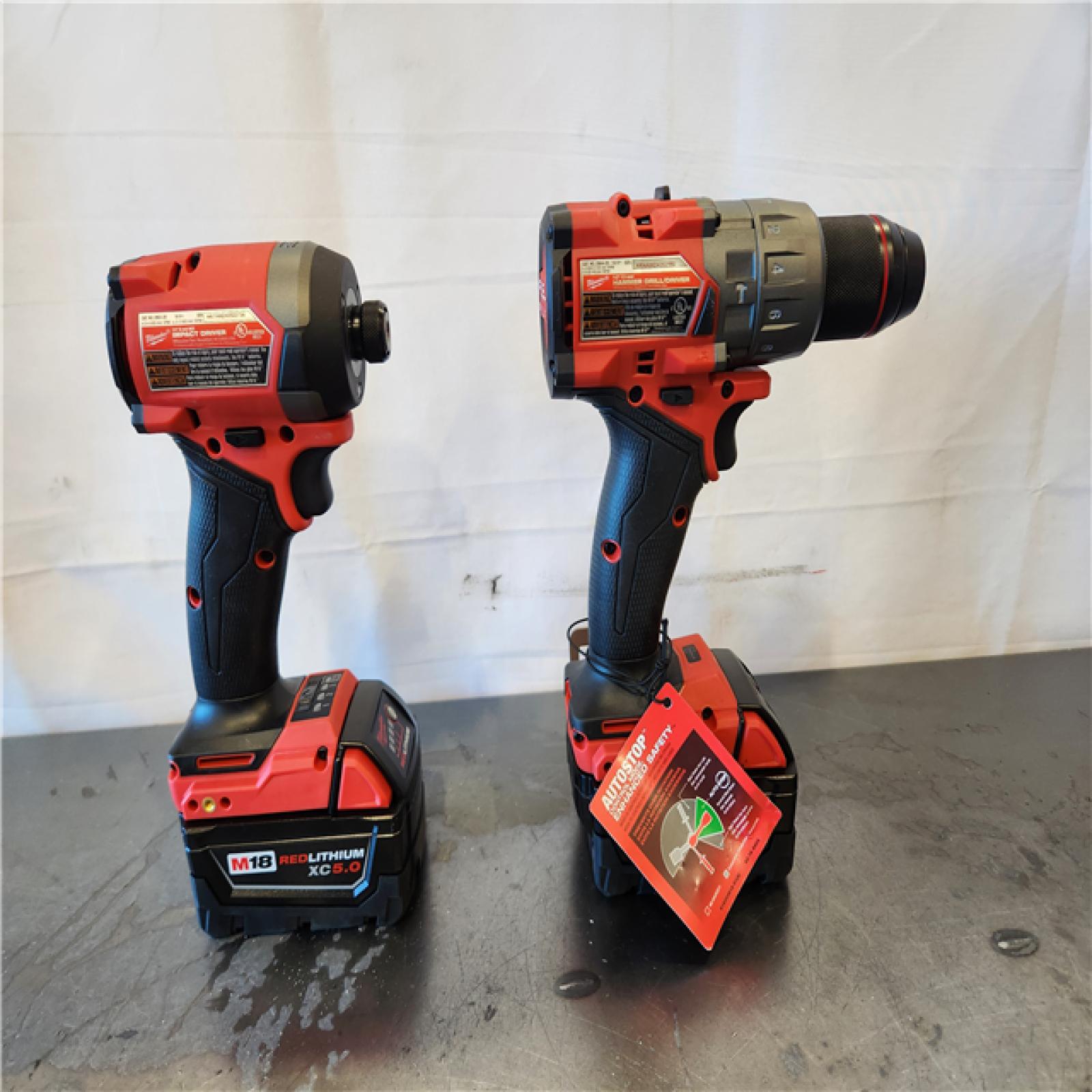 AS-IS- Milwaukee FUEL 18V Lithium-Ion Brushless Cordless Hammer Drill and Impact Driver Combo Kit