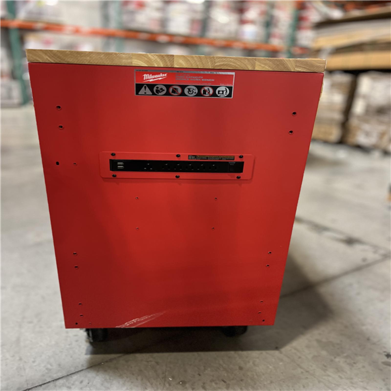 DALLAS LOCATION- AS-IS  Milwaukee Tool Storage 52 in. W x 22 in. D Heavy Duty Red Mobile Workbench Cabinet