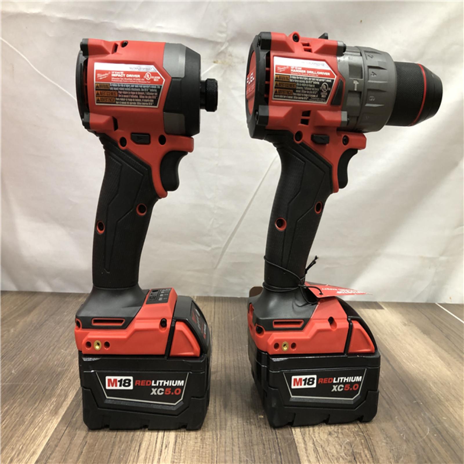 AS-IS Milwaukee FUEL 18V Lithium-Ion Brushless Cordless Hammer Drill and Impact Driver Combo Kit