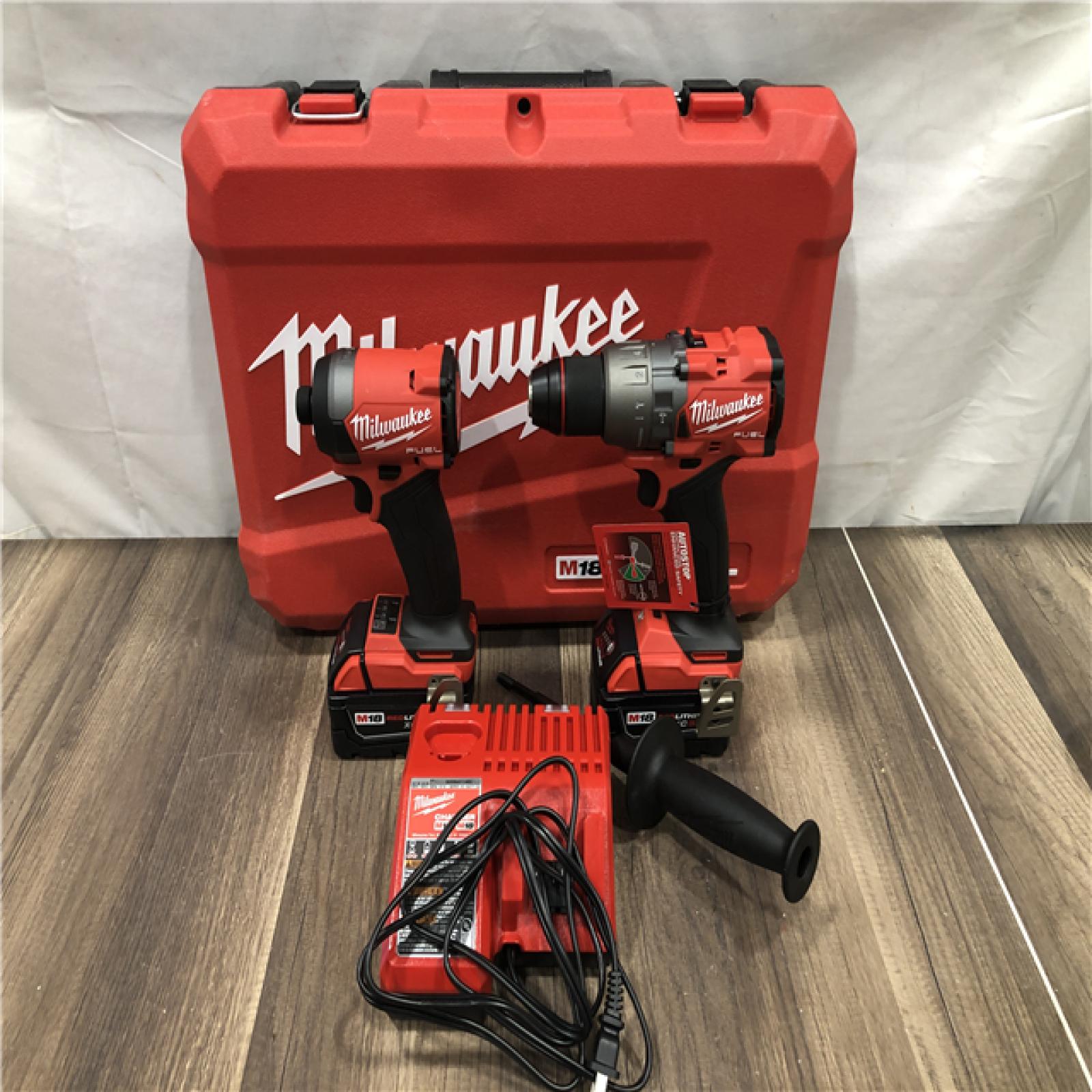 AS-IS Milwaukee FUEL 18V Lithium-Ion Brushless Cordless Hammer Drill and Impact Driver Combo Kit