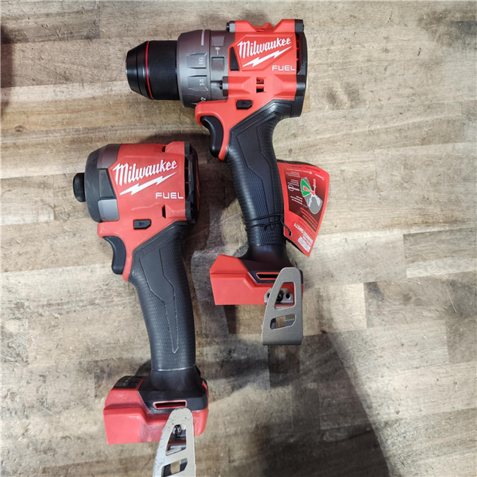 HOUSTON LOCATION - AS-IS Milwaukee FUEL 18V Lithium-Ion Brushless Cordless Hammer Drill and Impact Driver Combo Kit