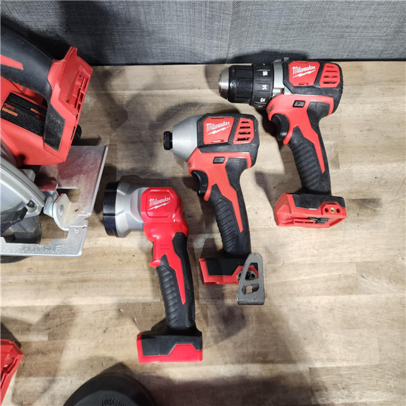 HOUSTON LOCATION - AS-IS Milwaukee M18 18-Volt Lithium-Ion Cordless Combo Kit 7-Tool with 2-Batteries, Charger