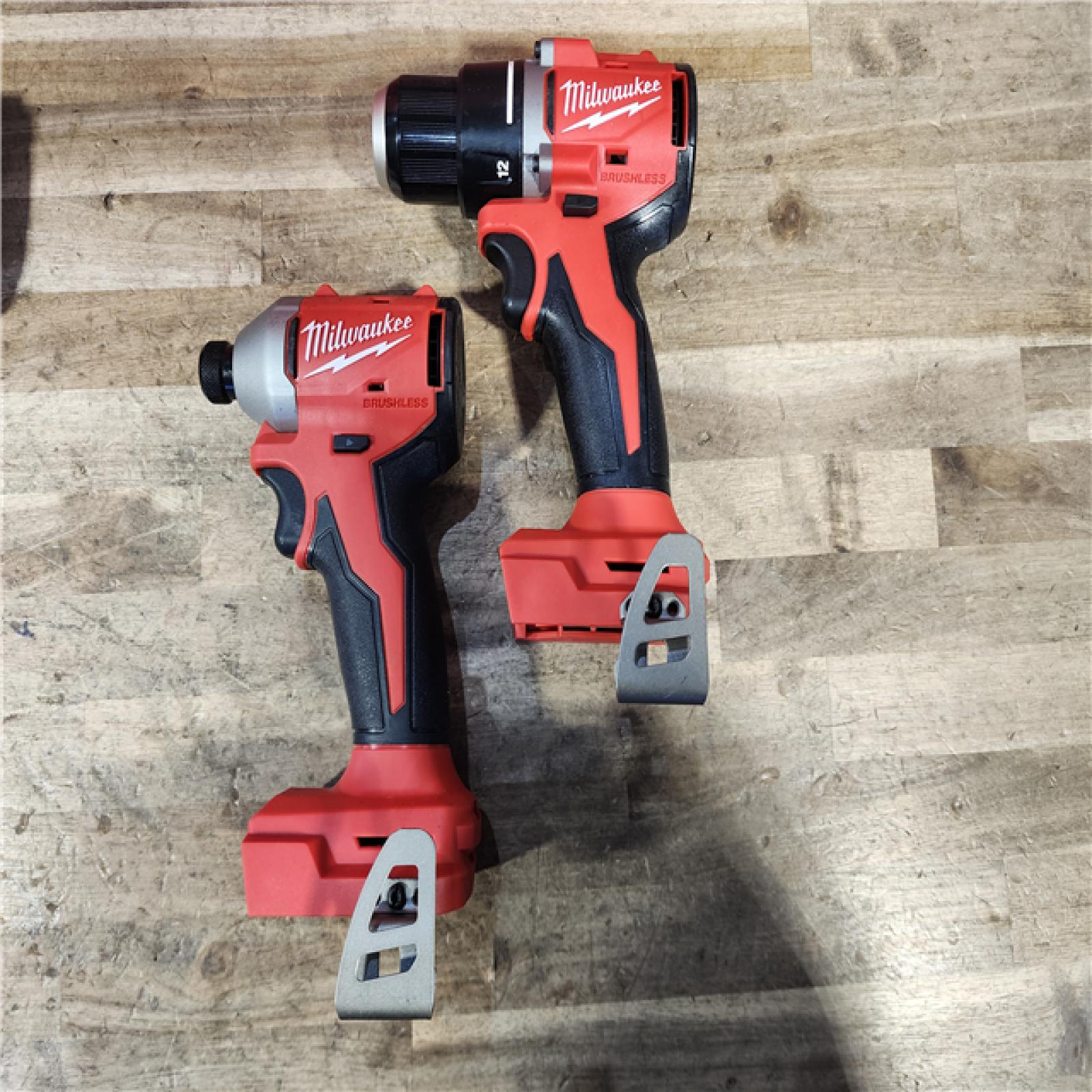 HOUSTON LOCATION - AS-IS Milwaukee M18 18V Lithium-Ion Brushless Cordless Compact Drill/Impact Combo Kit (2-Tool) W/(2) 2.0 Ah Batteries  Charger & Bag