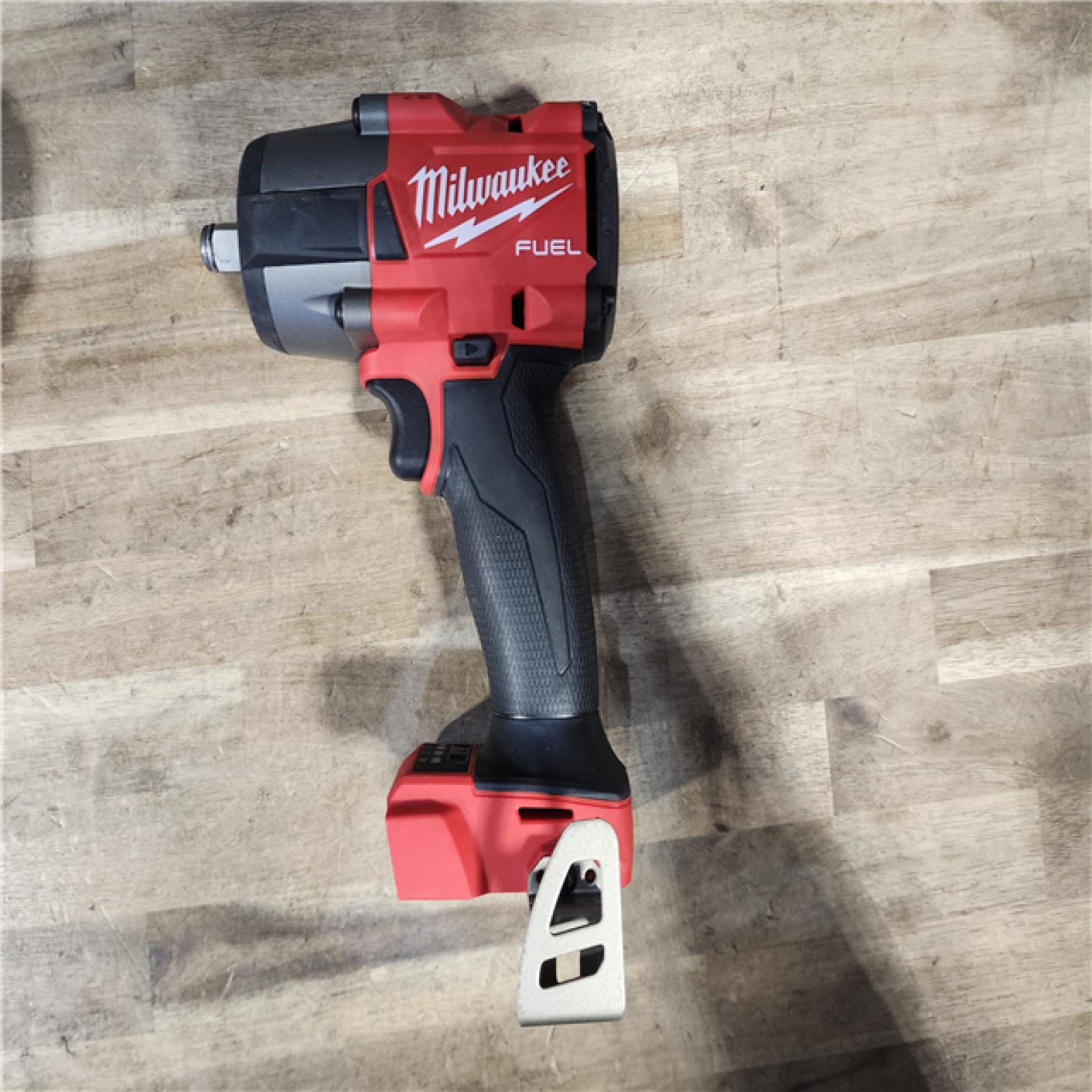 HOUSTON LOCATION - AS-IS Milwaukee M18 18V Fuel 1/2 Mid-Torque Impact Wrench Cordless Lithium-Ion Brushless with Friction Ring 2962-20 W/ BATTERY & CHARGER