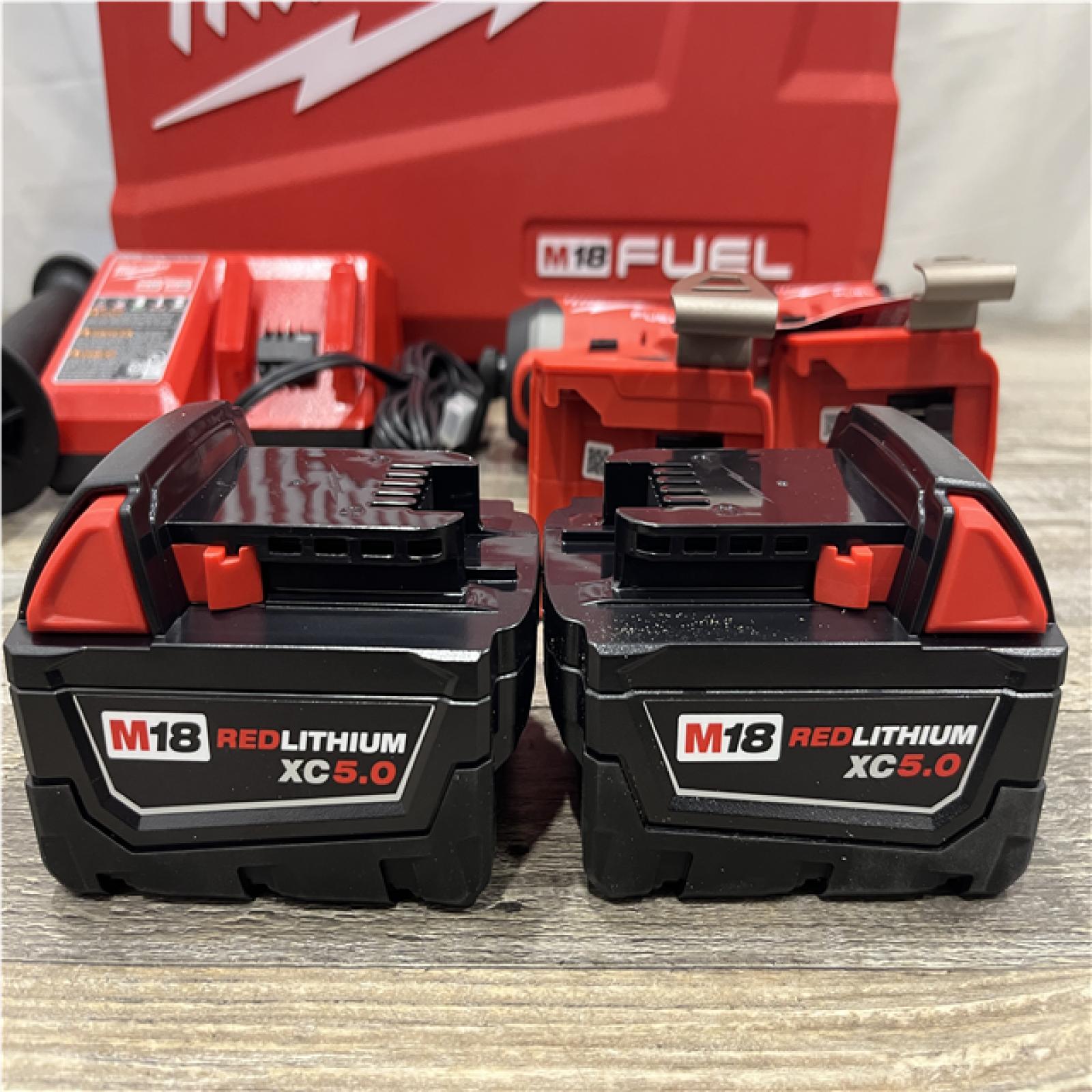 AS-IS Milwaukee FUEL 18V Lithium-Ion Brushless Cordless Hammer Drill and Impact Driver Combo Kit