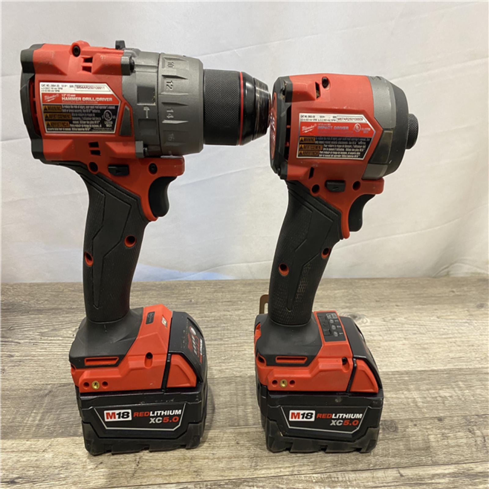 AS-IS Milwaukee FUEL 18V Lithium-Ion Brushless Cordless Hammer Drill and Impact Driver Combo Kit