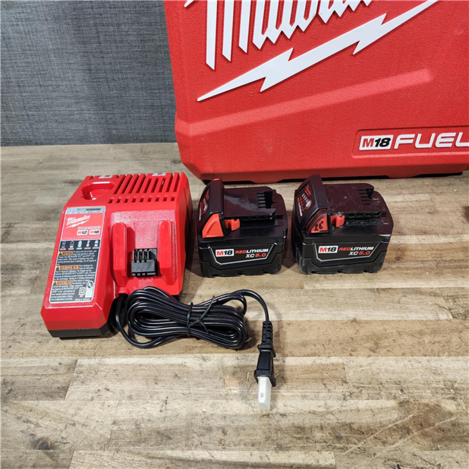 HOUSTON LOCATION - AS-IS Milwaukee FUEL 18V Lithium-Ion Brushless Cordless Hammer Drill and Impact Driver Combo Kit