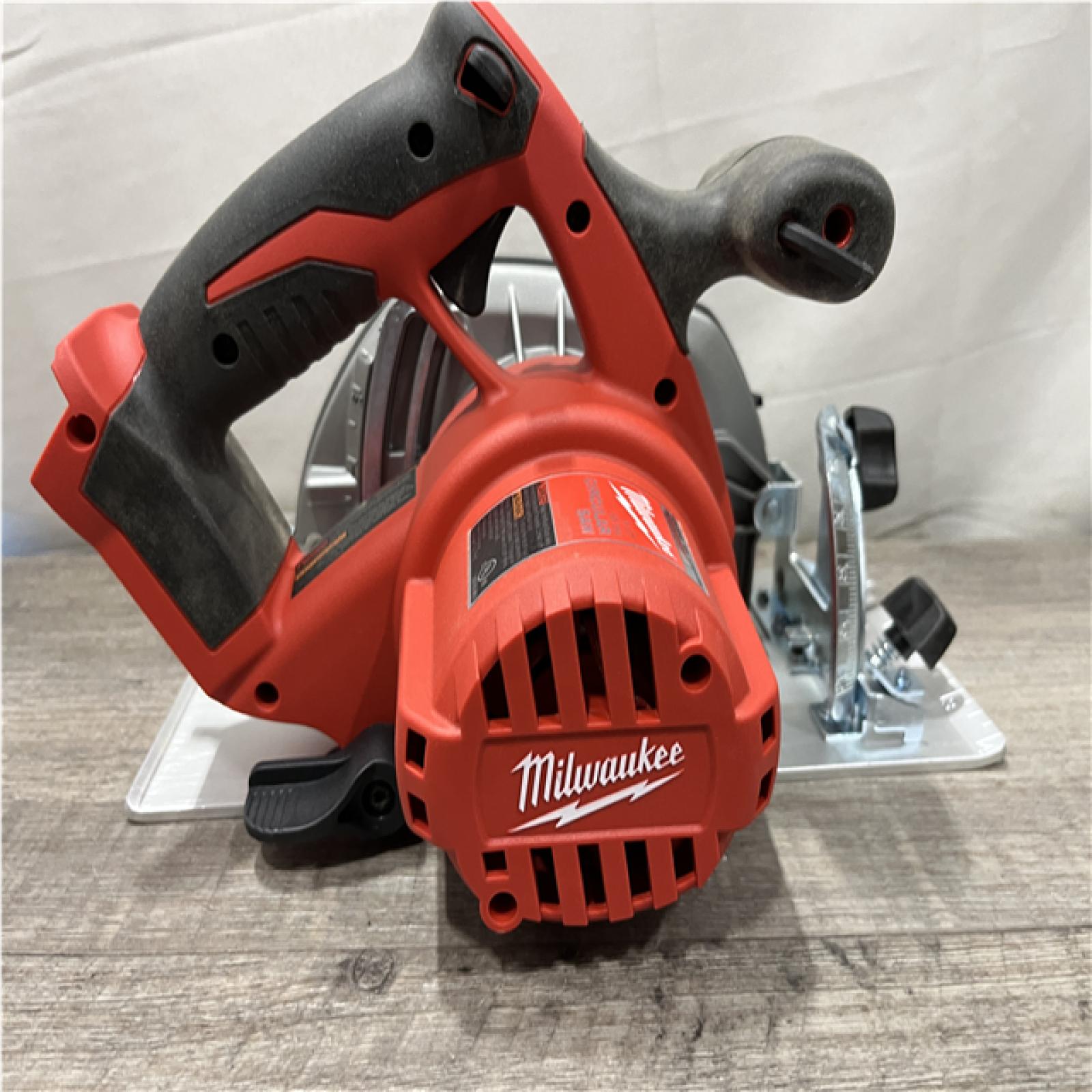 AS-IS Milwaukee 18V Lithium-Ion Cordless 6-1/2 in. Circular Saw (Tool-Only)
