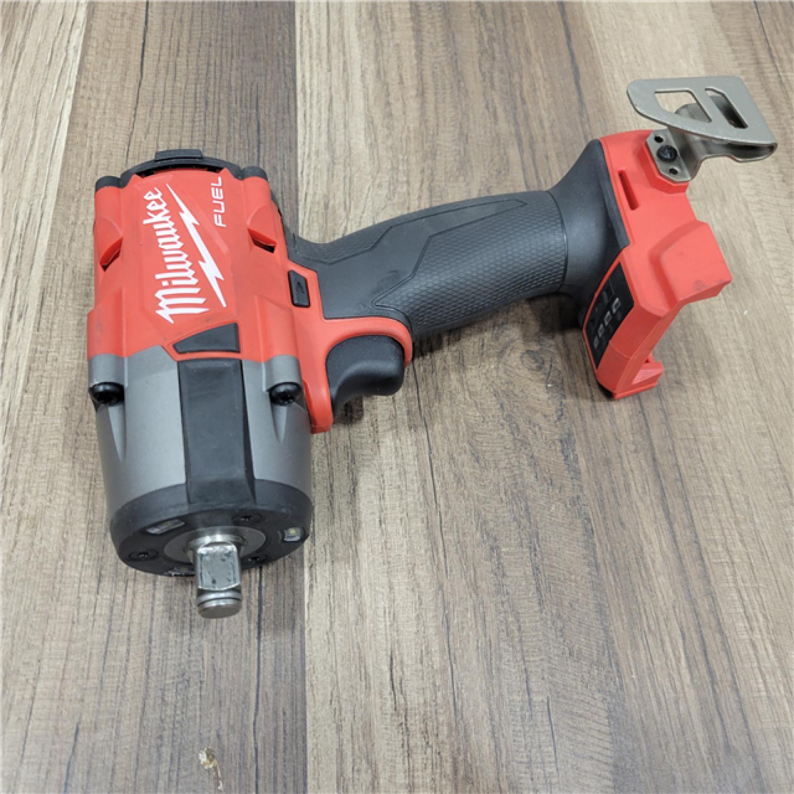 AS-IS  Milwaukee M18 18V Fuel 1/2  Mid-Torque Impact Wrench Cordless Lithium-Ion Brushless with Friction Ring 2962-20