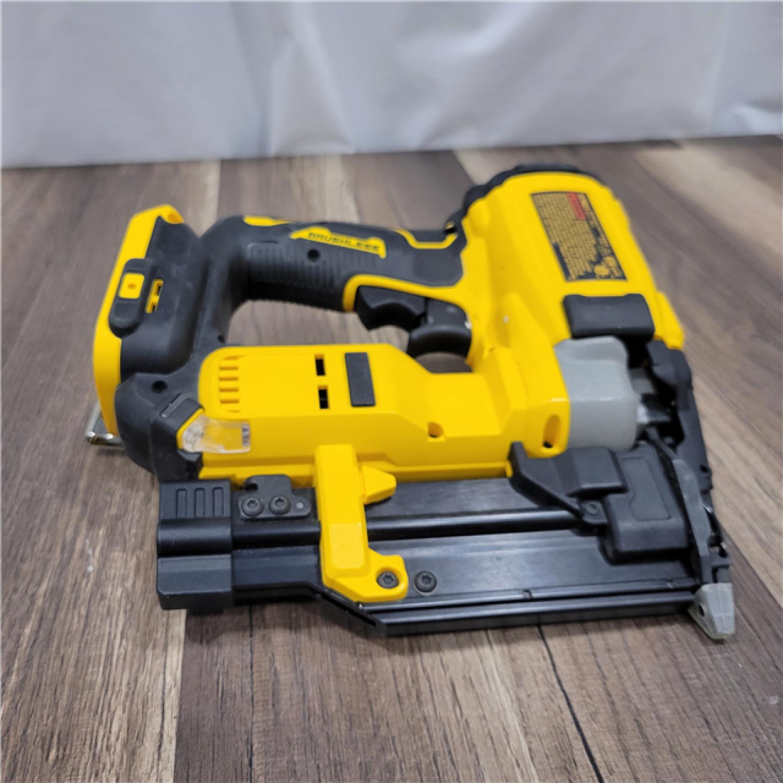 AS-IS DEWALT ATOMIC 20V MAX Lithium Ion Cordless 23 Gauge Pin Nailer Kit with 3.0Ah Battery and Charger