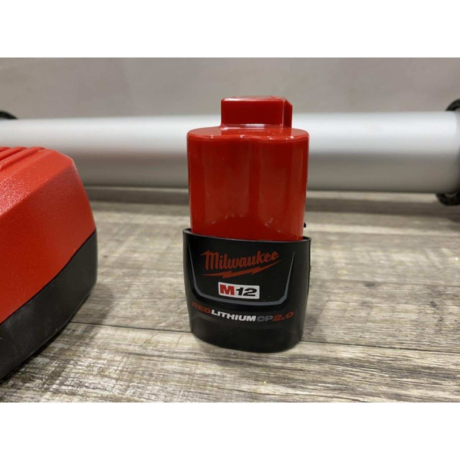 AS-IS Milwaukee 12V Lithium-ion Cordless 20 oz. Aluminum Barrel Adhesive and Caulk Gun Kit