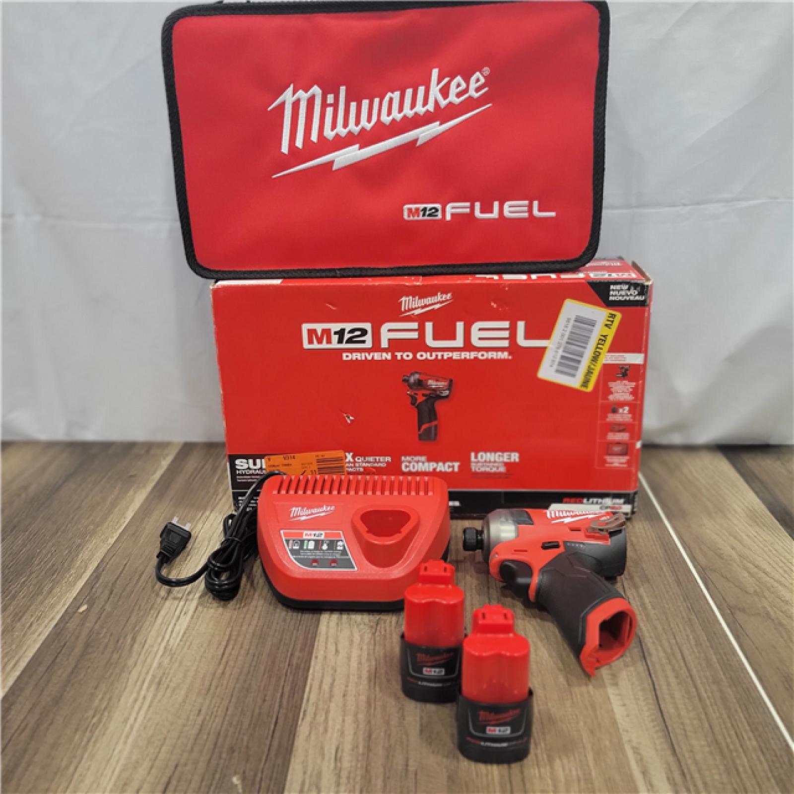 AS-IS M12 Milwaukee FUEL SURGE 12V Lithium-Ion Brushless Cordless 1/4 in. Hex Impact Driver Compact Kit W/Two 2.0Ah Batteries, Bag