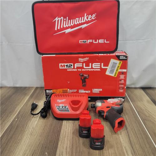 AS-IS M12 Milwaukee FUEL SURGE 12V Lithium-Ion Brushless Cordless 1/4 in. Hex Impact Driver Compact Kit W/Two 2.0Ah Batteries, Bag