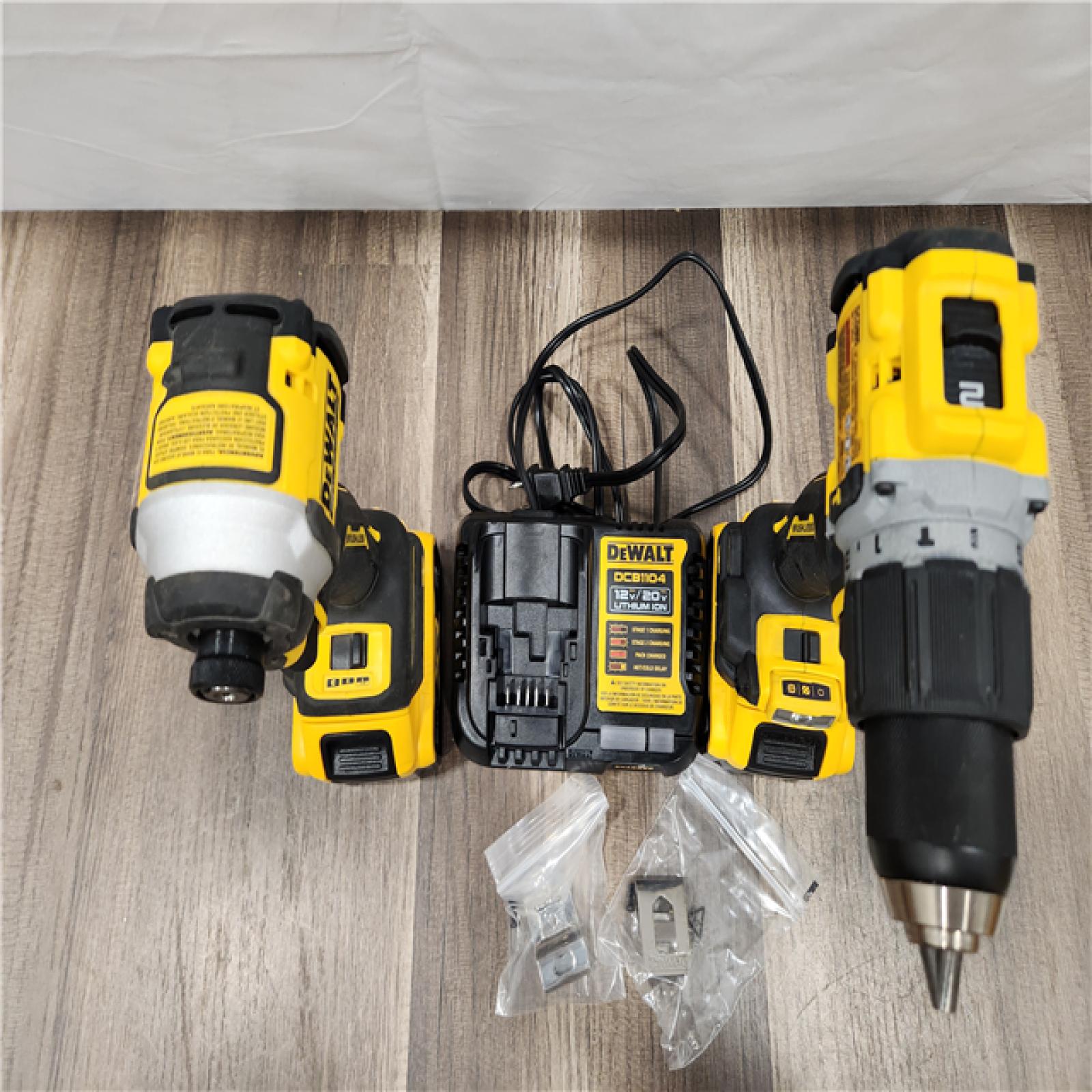 AS-IS DEWALT 20V MAX XR Hammer Drill and ATOMIC Impact Driver 2 Tool Cordless Combo Kit with (2) 4.0Ah Batteries, Charger, and Bag