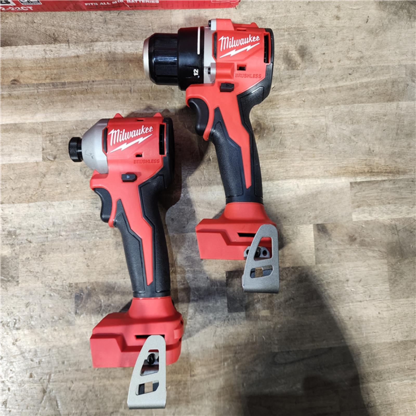 HOUSTON LOCATION - AS-IS Milwaukee M18 18V Lithium-Ion Brushless Cordless Compact Drill/Impact Combo Kit (2-Tool) W/(2) 2.0 Ah Batteries  Charger & Bag