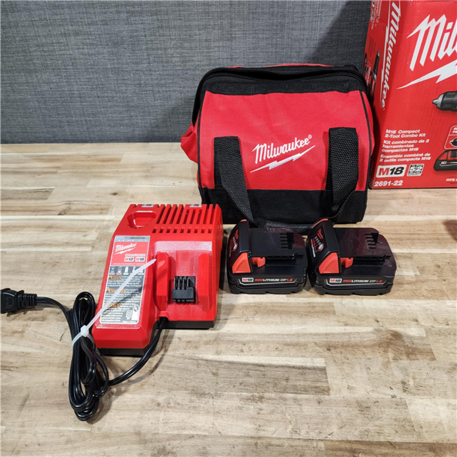 HOUSTON LOCATION - AS-IS Milwaukee 18V Lithium-Ion Cordless Drill Driver/Impact Driver Combo Kit