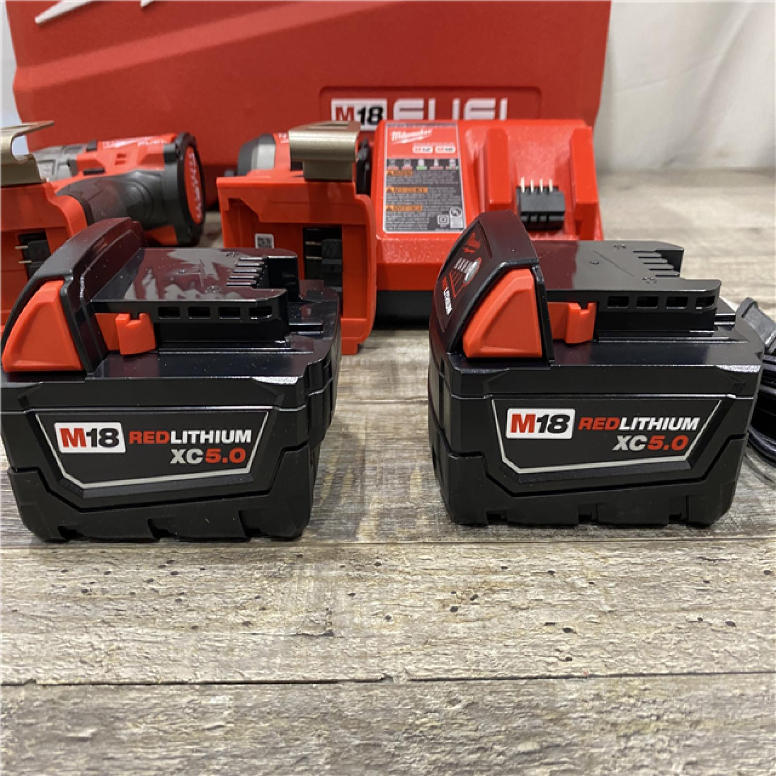 AS-IS Milwaukee FUEL 18V Lithium-Ion Brushless Cordless Hammer Drill and Impact Driver Combo Kit