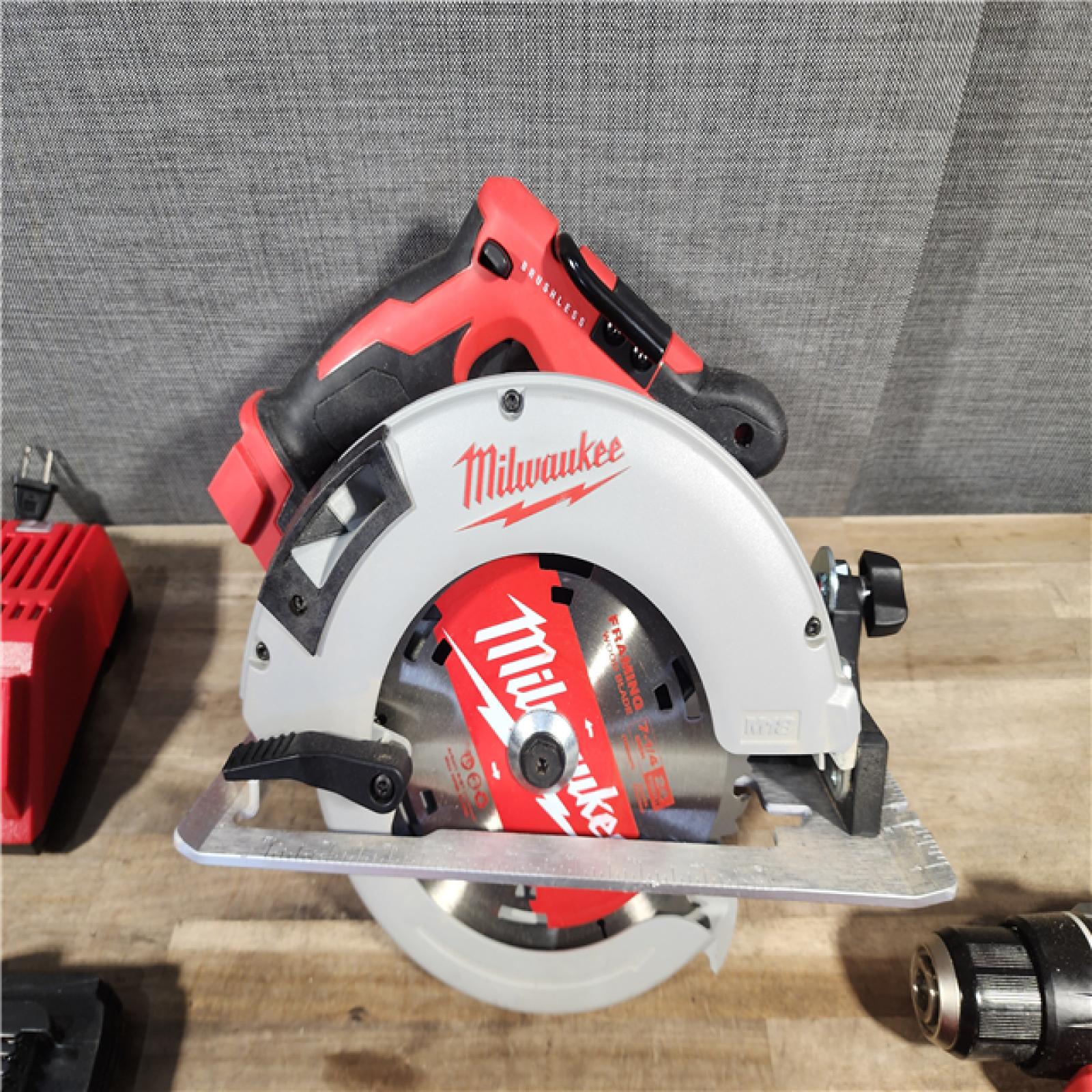 HOUSTON LOCATION - AS-IS MILWAUKEE 4 TOOL COMBO KIT W/ (2) BATTERY & CHARGER