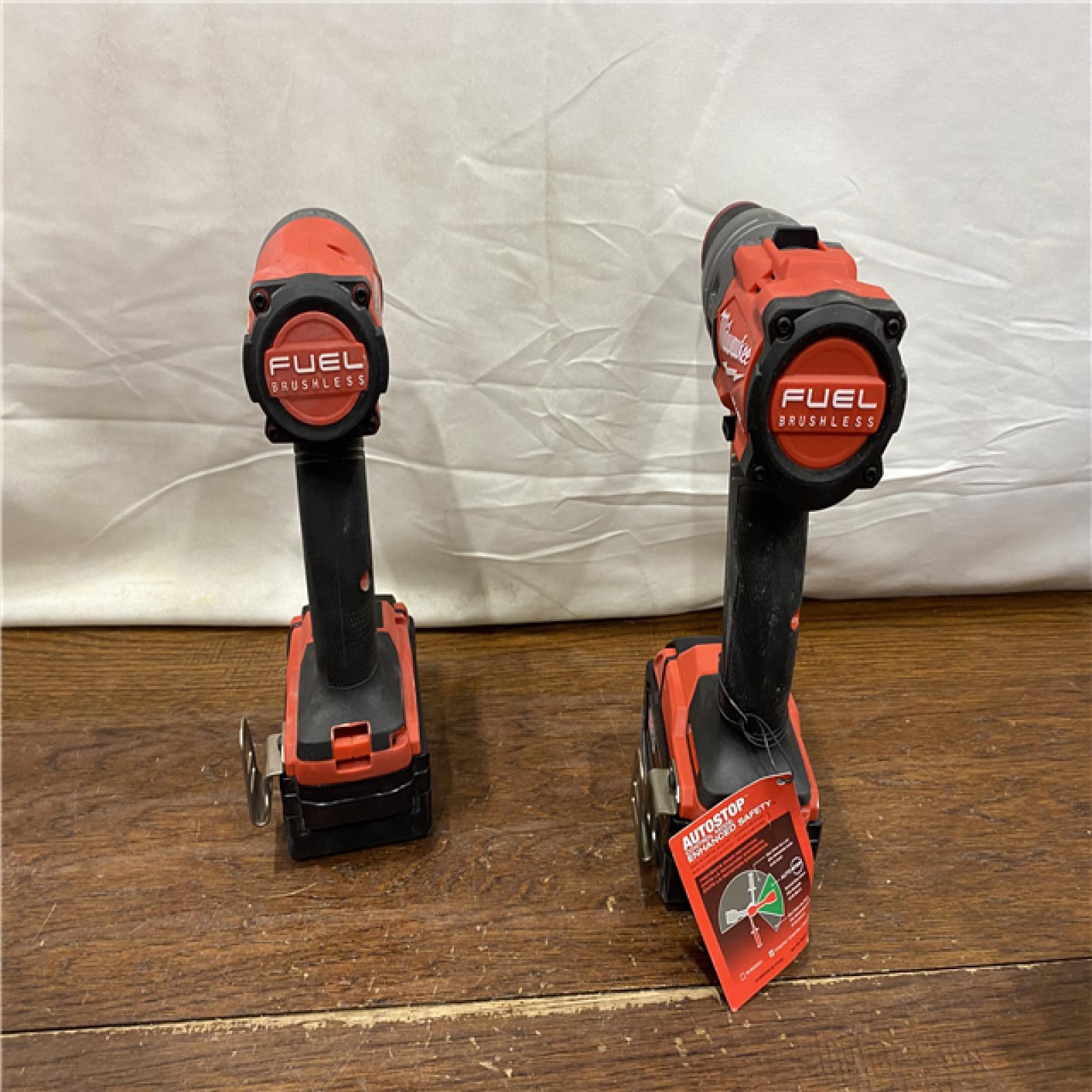 AS-IS MILWAUKEE M18 FUEL 18V Lithium-Ion Brushless Cordless Hammer Drill and Impact Driver Combo Kit (2-Tool) with 2 Batteries