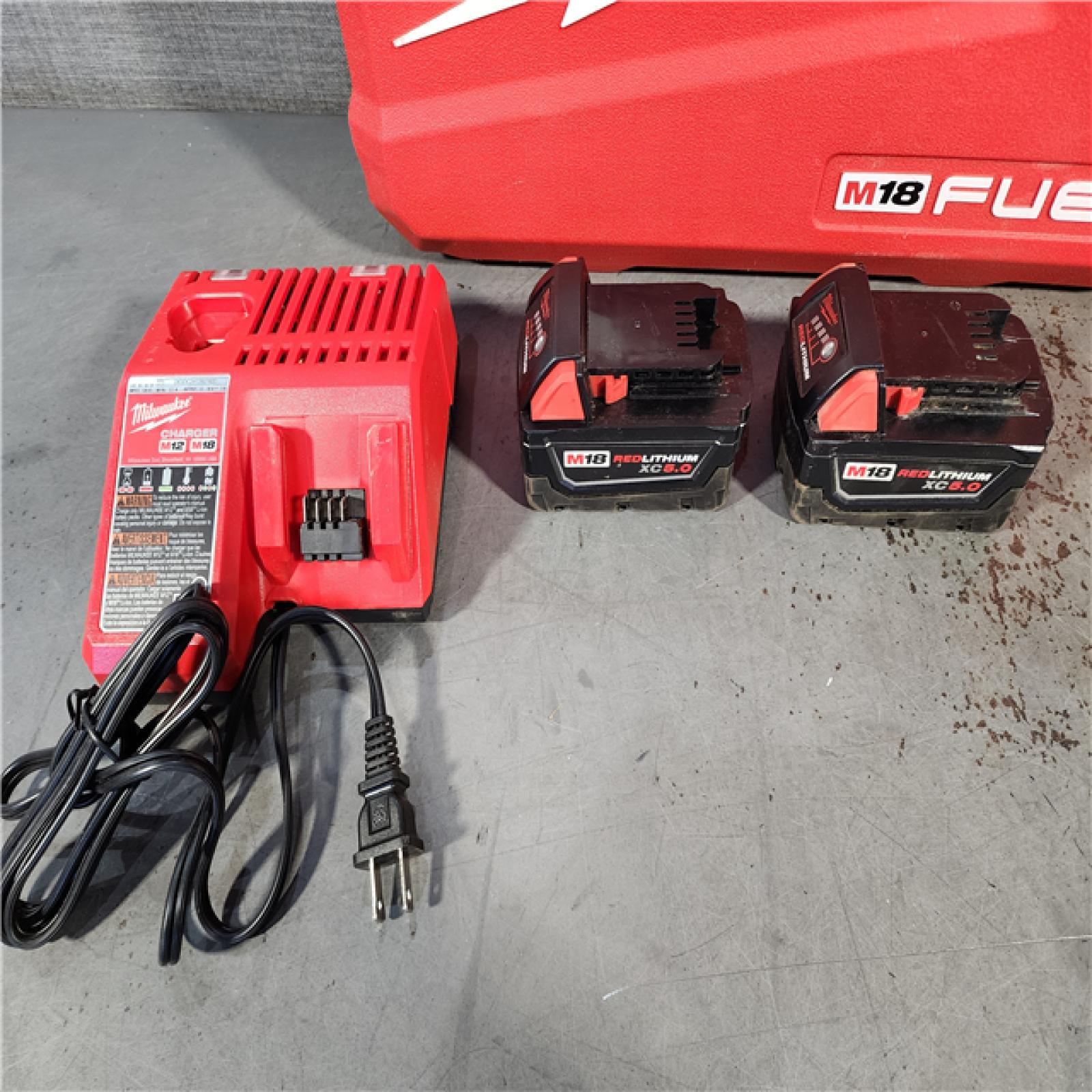 HOUSTON LOCATION - AS-IS MILWAUKEE FUEL 18V Lithium-Ion Brushless Cordless Hammer Drill and Impact Driver Combo Kit (2-Tool) with 2 Batteries