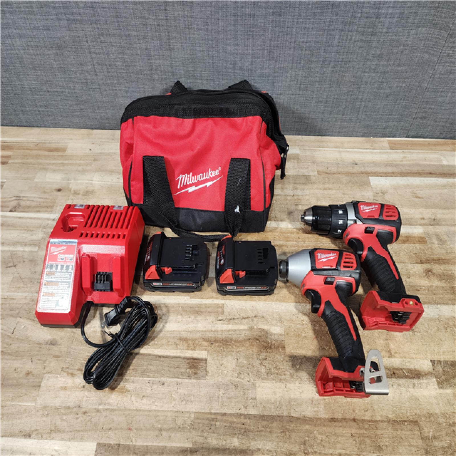 HOUSTON LOCATION - AS - IS Milwaukee 2 Tool Combo Kit W/ (2) Battery & Charger