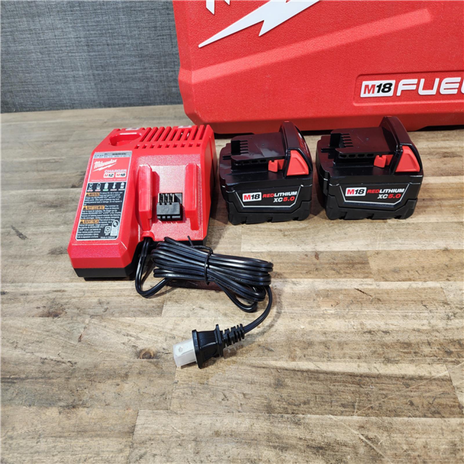 HOUSTON LOCATION - AS-IS (APPEARS LIKE NEW) Milwaukee FUEL 18V Lithium-Ion Brushless Cordless Hammer Drill and Impact Driver Combo Kit