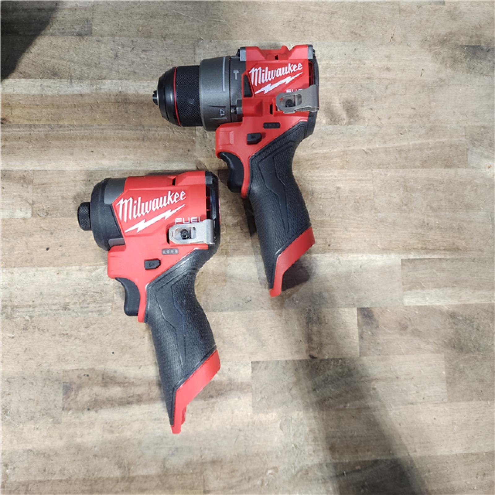 HOUSTON LOCATION - AS-IS Milwaukee FUEL 12-Volt Lithium-Ion Brushless Cordless Hammer Drill and Impact Driver Combo Kit