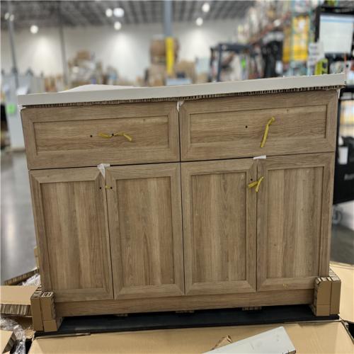 DALLAS LOCATION -  Home Decorators Collection Charbury 60 in. W x 22 in. D x 34 in. H Double Sink Freestanding Vanity in Light Oak w/ White Engineered Stone Top